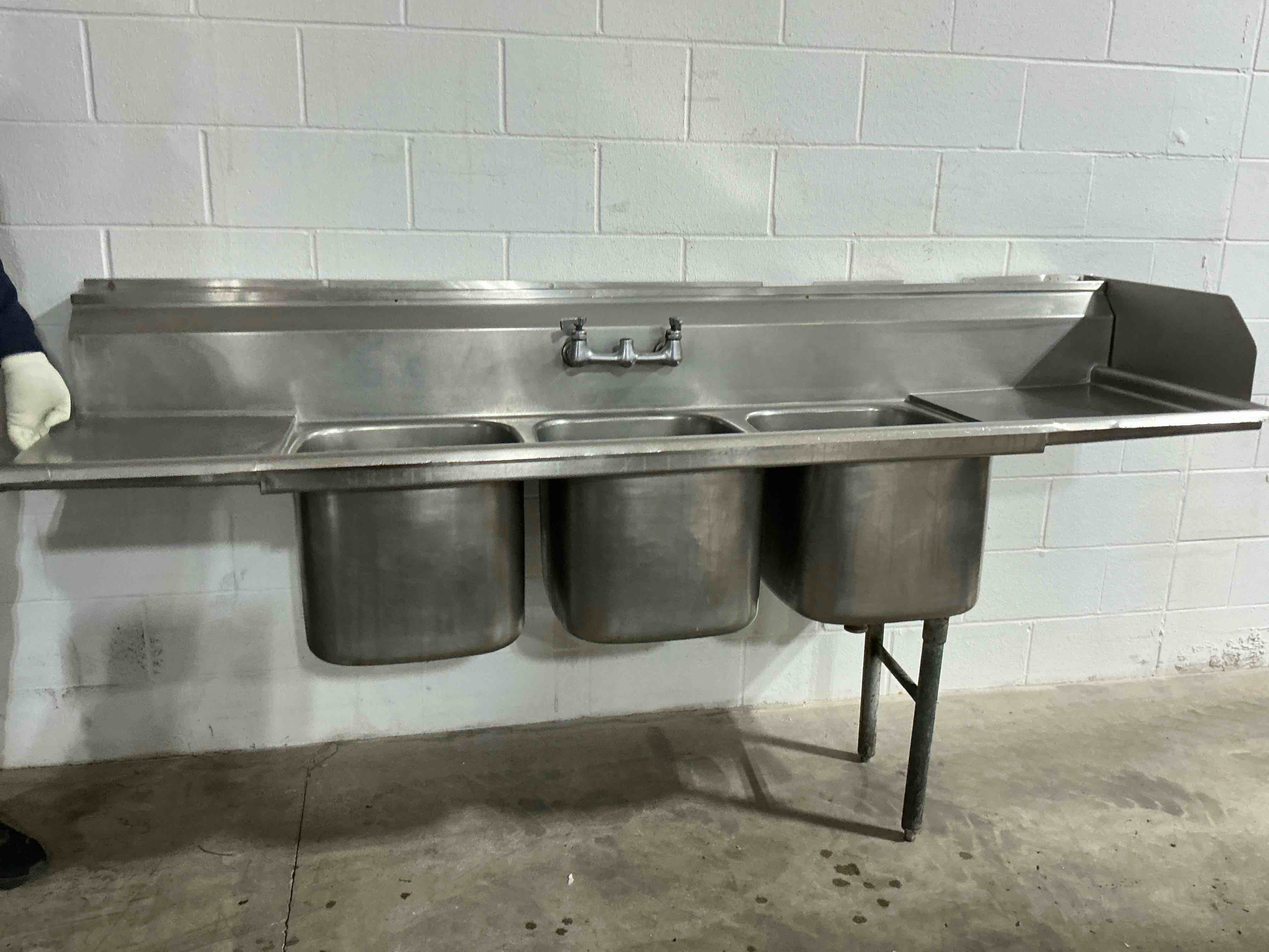 Condition photo showing As Is for 90” x 44.5” 3 tub dishwashing sink 