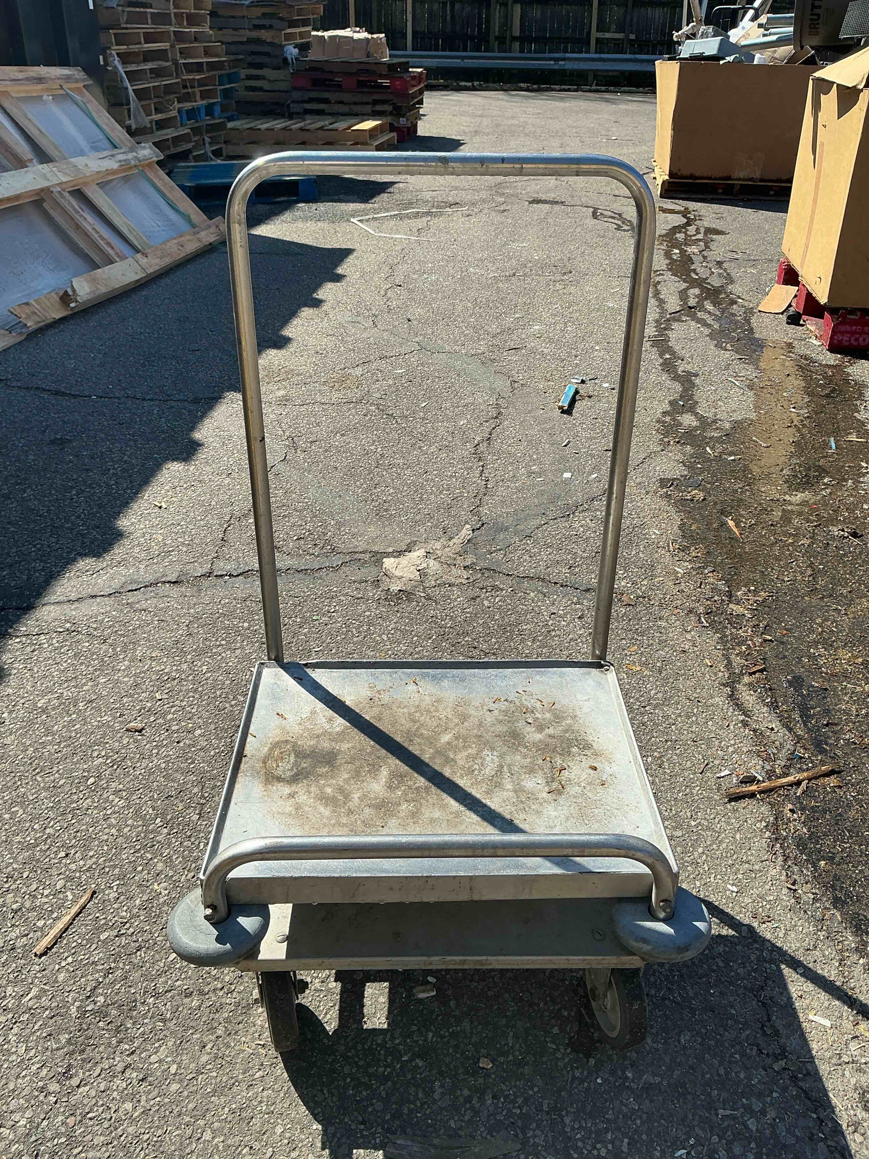 Condition photo showing As Is for restaruant dolly stainless steel 