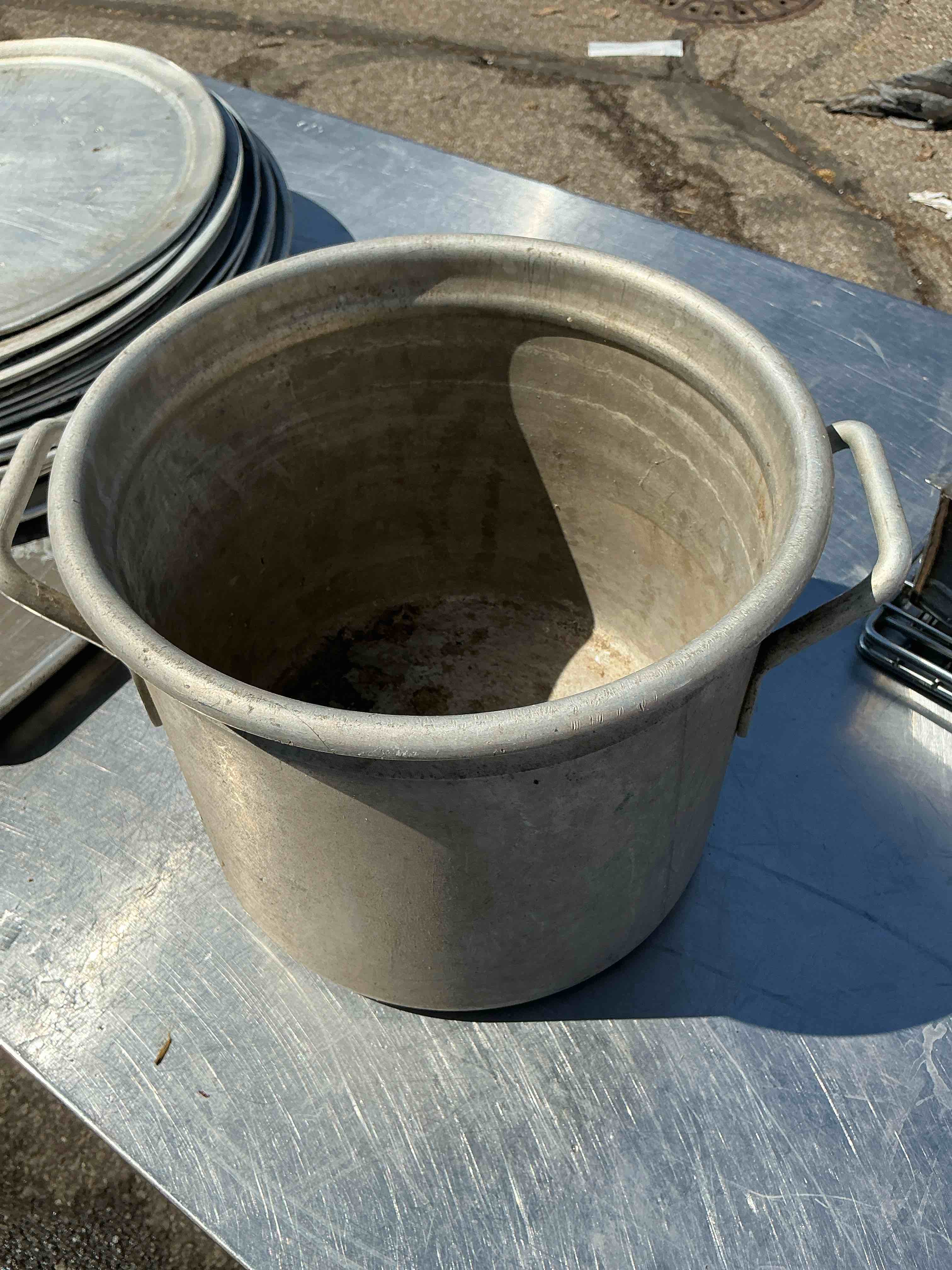 Condition photo showing As Is for stock pot 