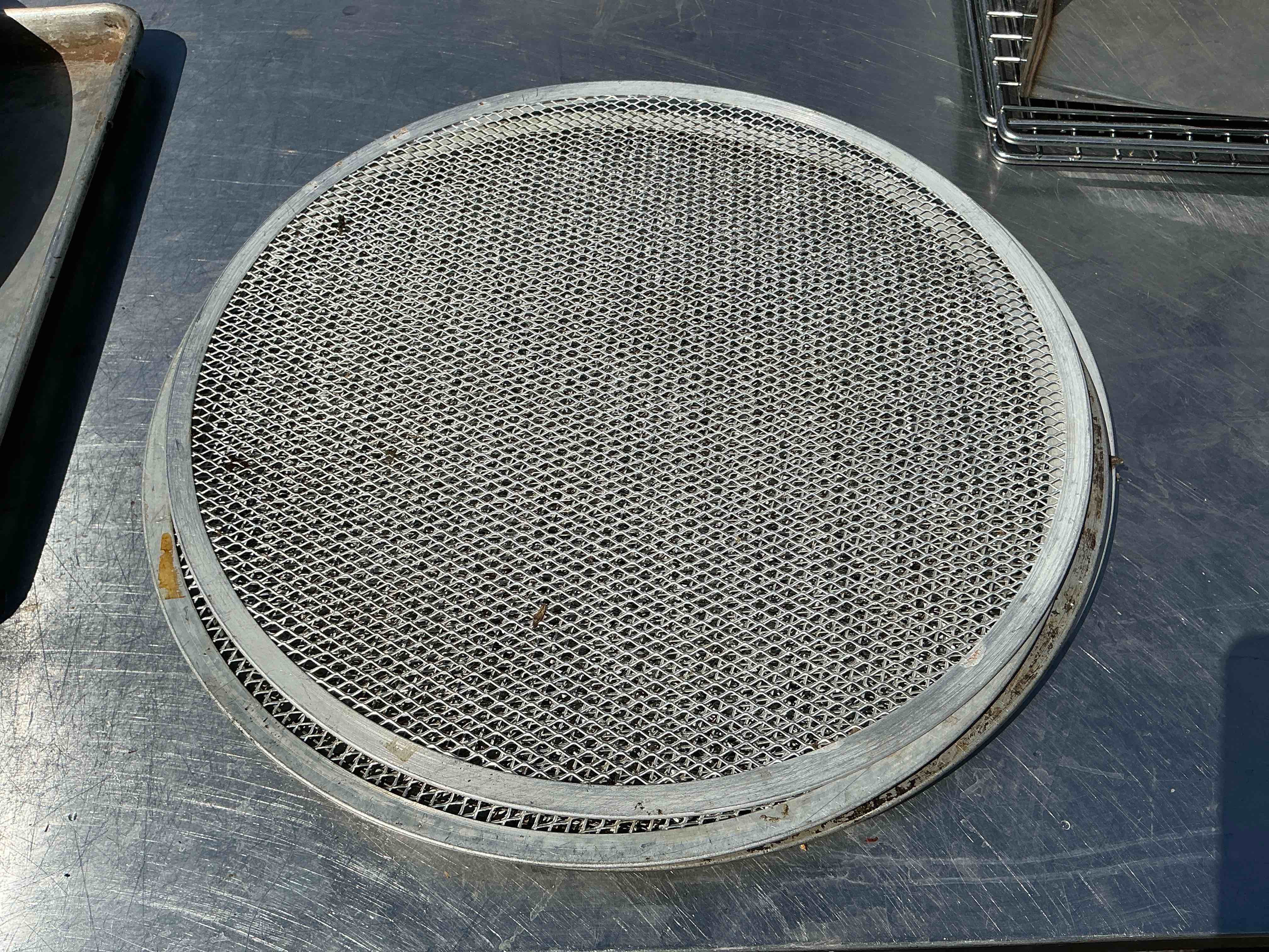 Condition photo showing As Is for 17” pizza screen 