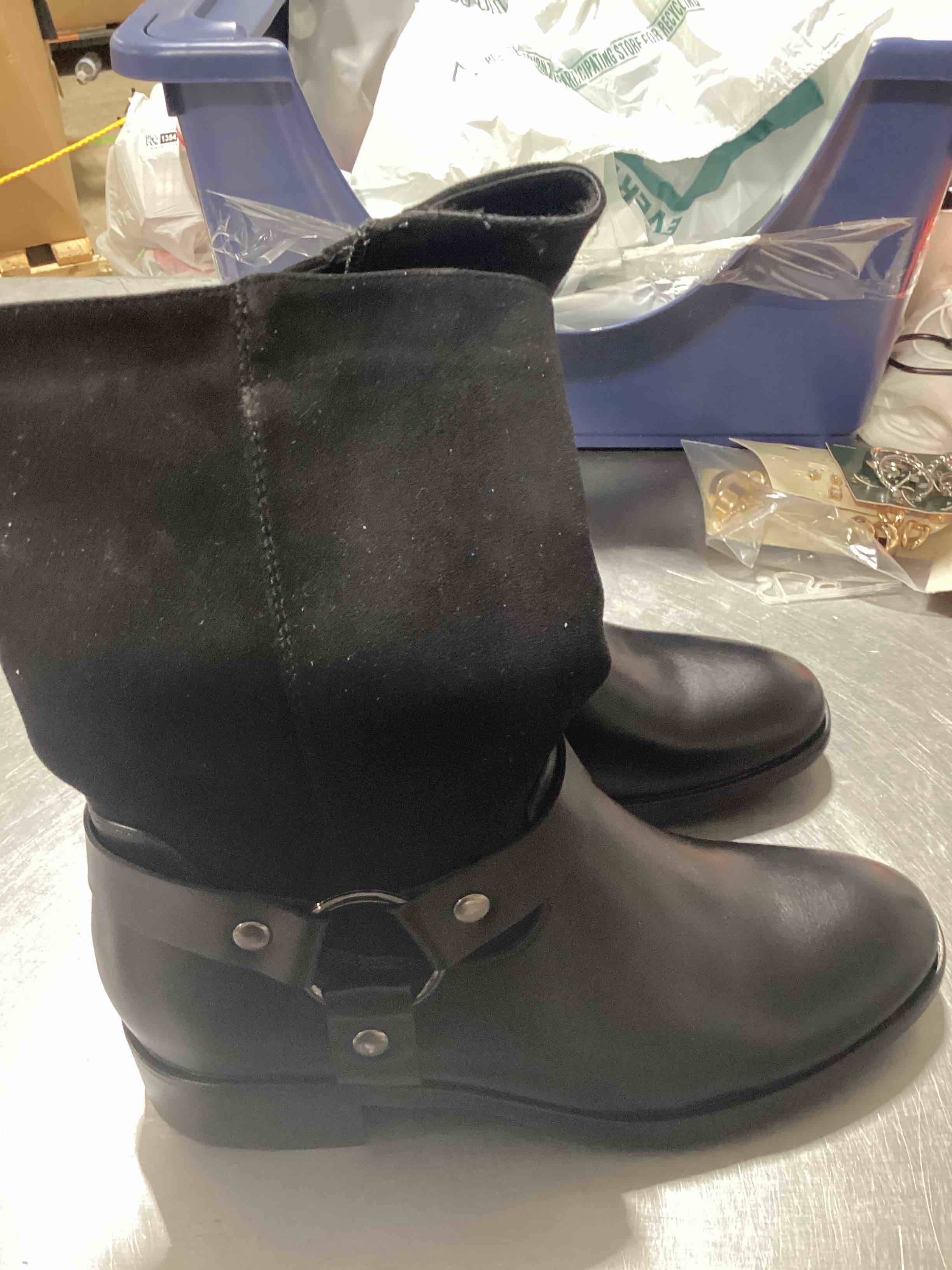black boot with buckle on them 