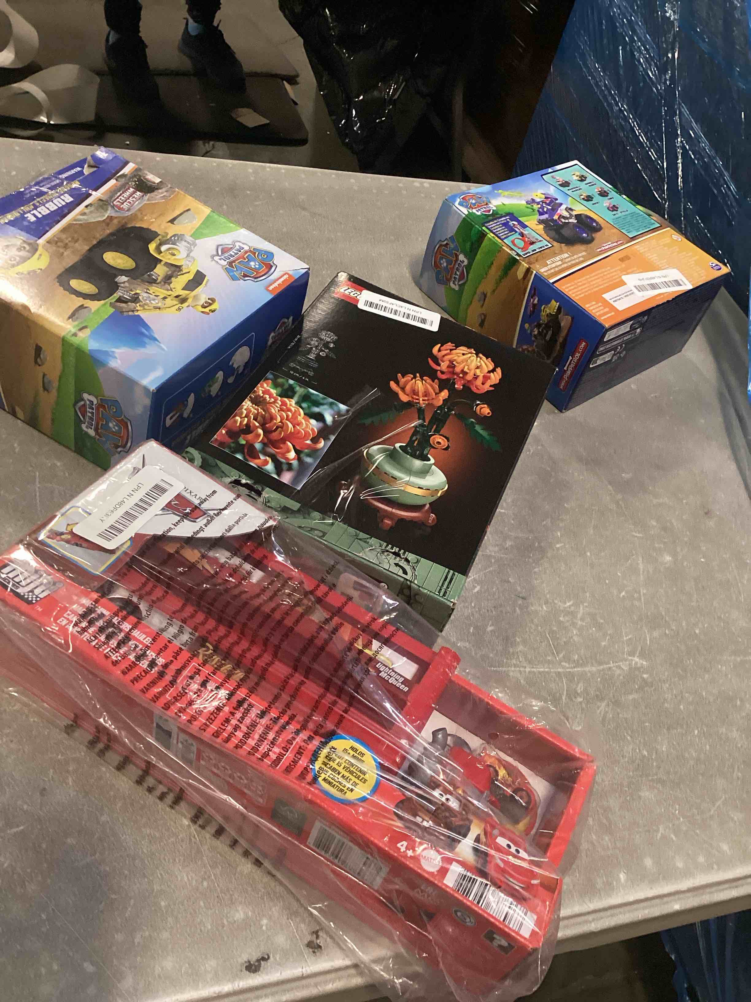  assortment of toys for kids boys and girls  of different ages that includes INCOHEARENT, MAIN STREET VILLAGE 1000 piece, CHARLES WYSHOCKI AND MORE