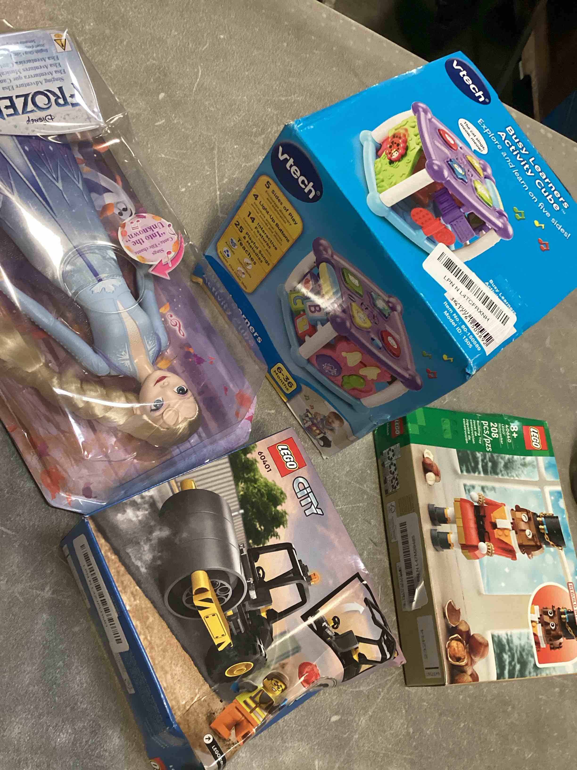  assortment of toys for kids boys and girls  of different ages that includes INCOHEARENT, MAIN STREET VILLAGE 1000 piece, CHARLES WYSHOCKI AND MORE