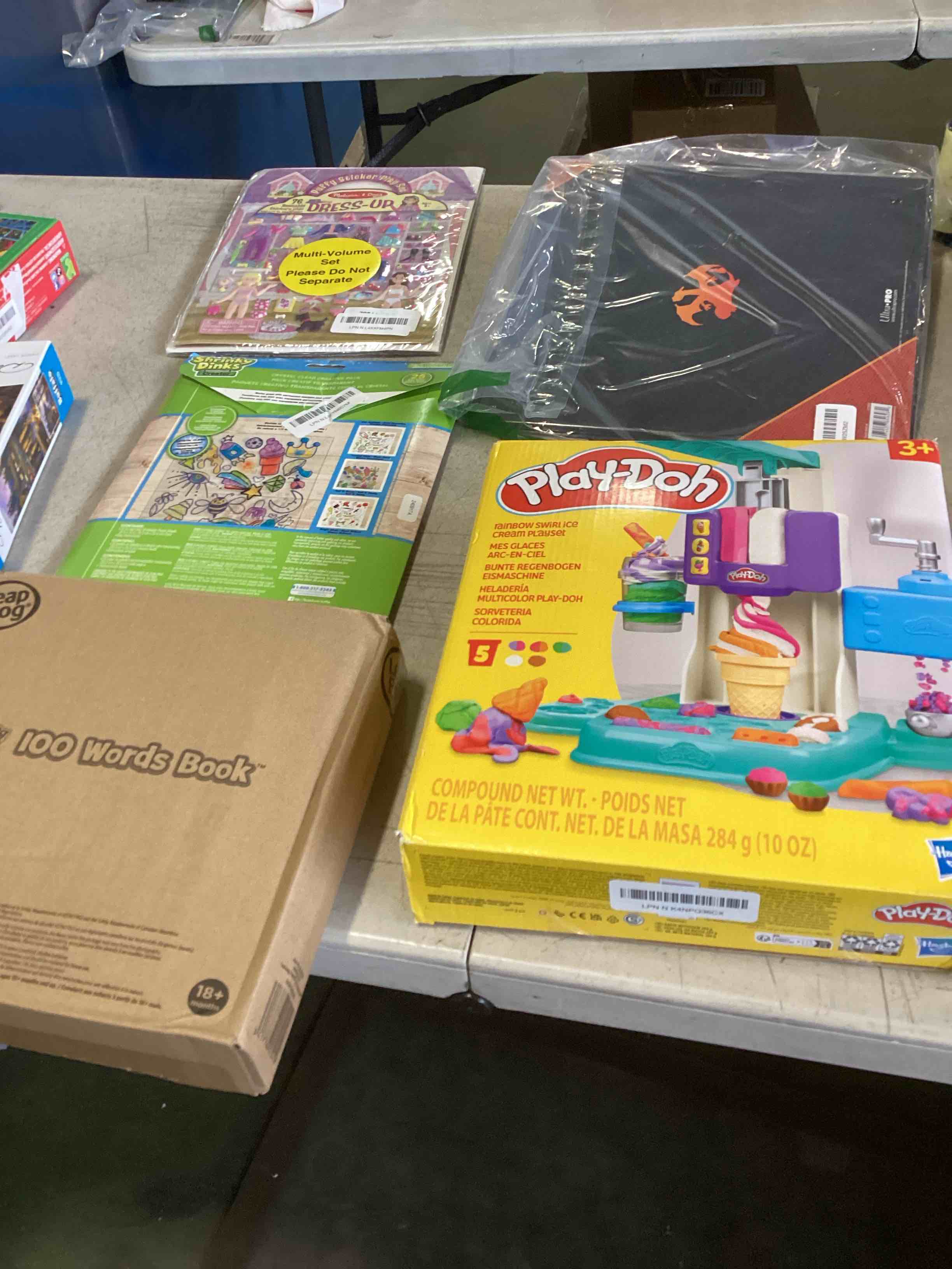  assortment of toys for kids boys and girls  of different ages that includes INCOHEARENT, MAIN STREET VILLAGE 1000 piece, CHARLES WYSHOCKI AND MORE