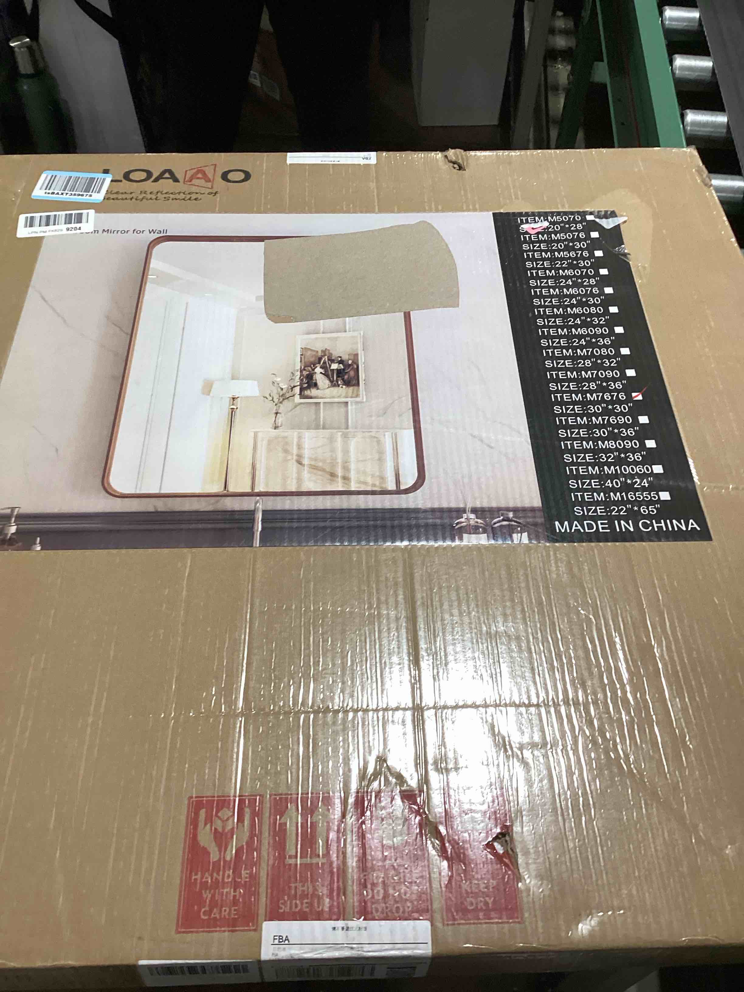 Condition photo showing As Is for LOAAO 30X30 Bathroom Mirror with Wood Grain Colored Metal Frame, Rounded Rectangle Metal Framed Bathroom Mirror, Anti-Rust, Hangs Horizontally or Vertically Wood Grain Colored 30"L x 30"W