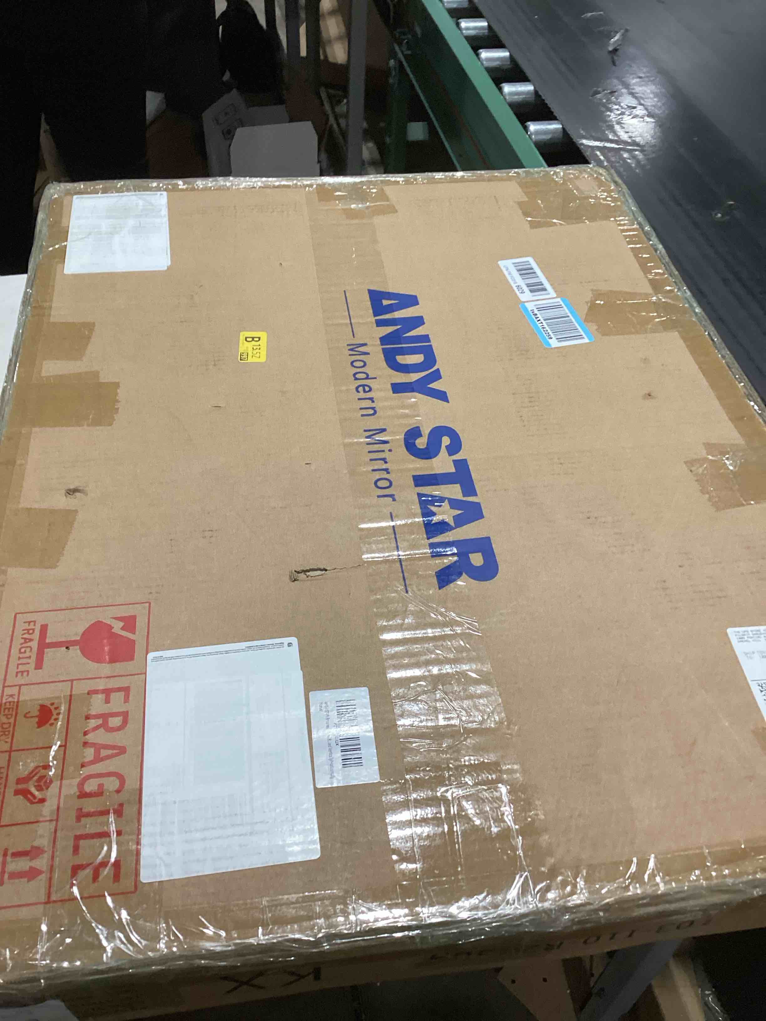 Condition photo showing As Is for ANDY STAR 22x30'' Brushed Nickel Bathroom Mirror, Rounded Rectangle Brushed Silver Mirror for Bathroom Vanity SUS304 Metal Tube Framed(Rustproof) 1’’ Deep Wall Mounted Vertically/Horizontally Brushed Nickel 30"L x 22"W