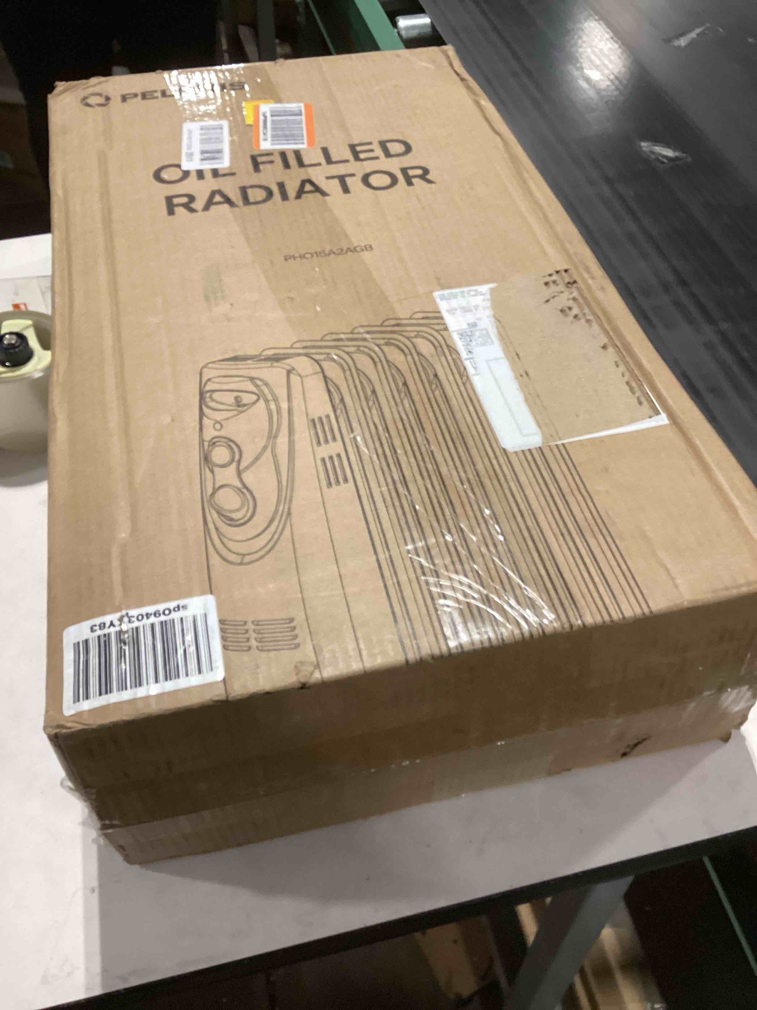 Condition photo showing As Is for PELONIS PHO15A2AGB, Basic Electric Oil Filled Radiator,black space heater, 26.10 x 14.20 x 11.00 Black 2024 Basic