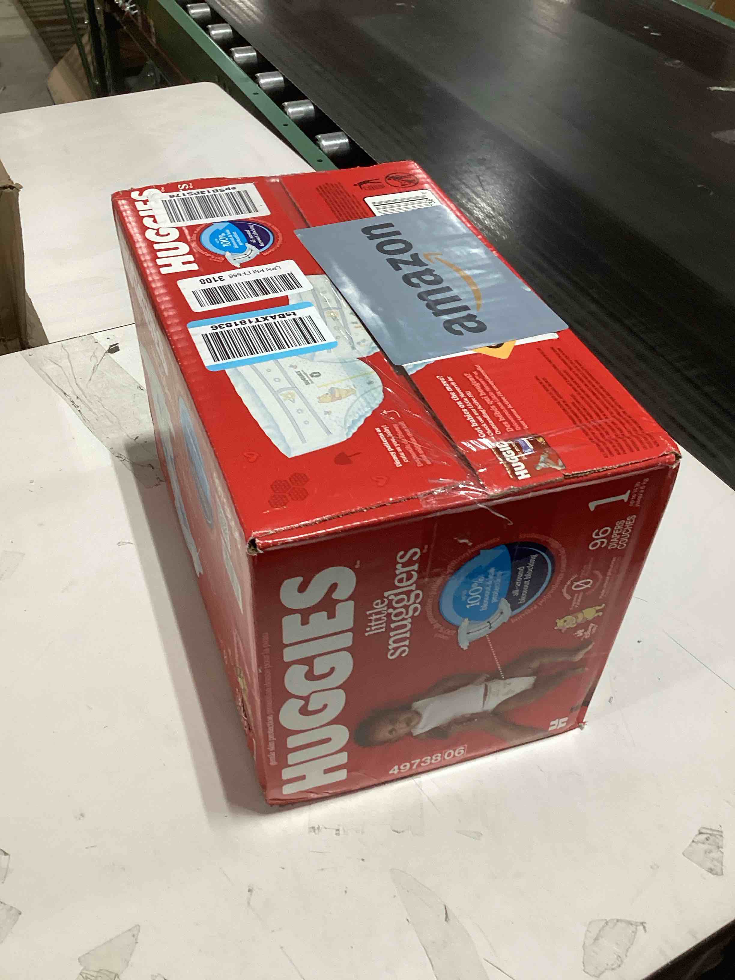 Condition photo showing Good Condition for Huggies Size 1 Diapers, Little Snugglers Baby Diapers, Size 1 (8-14 lbs), 96 Count, Packaging May Vary