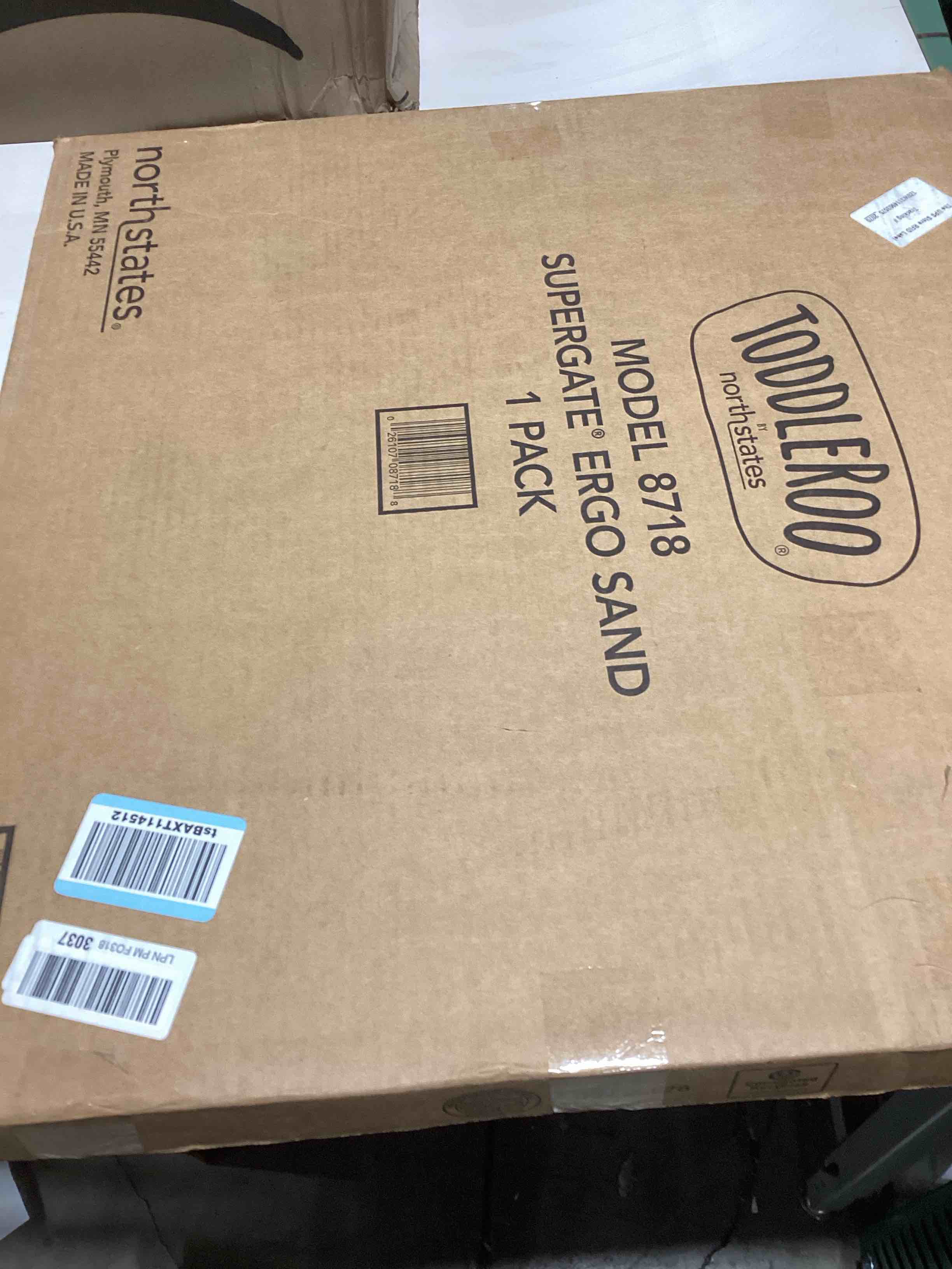 Condition photo showing As Is for Toddleroo by North States 42” Wide Supergate Ergo Baby Gate, Made in USA: For Doorways or stairways. Includes Wall Cups. Pressure or Hardware Mount. 26” - 42” Wide (26" Tall, Sand) (B01HG7E5R8)