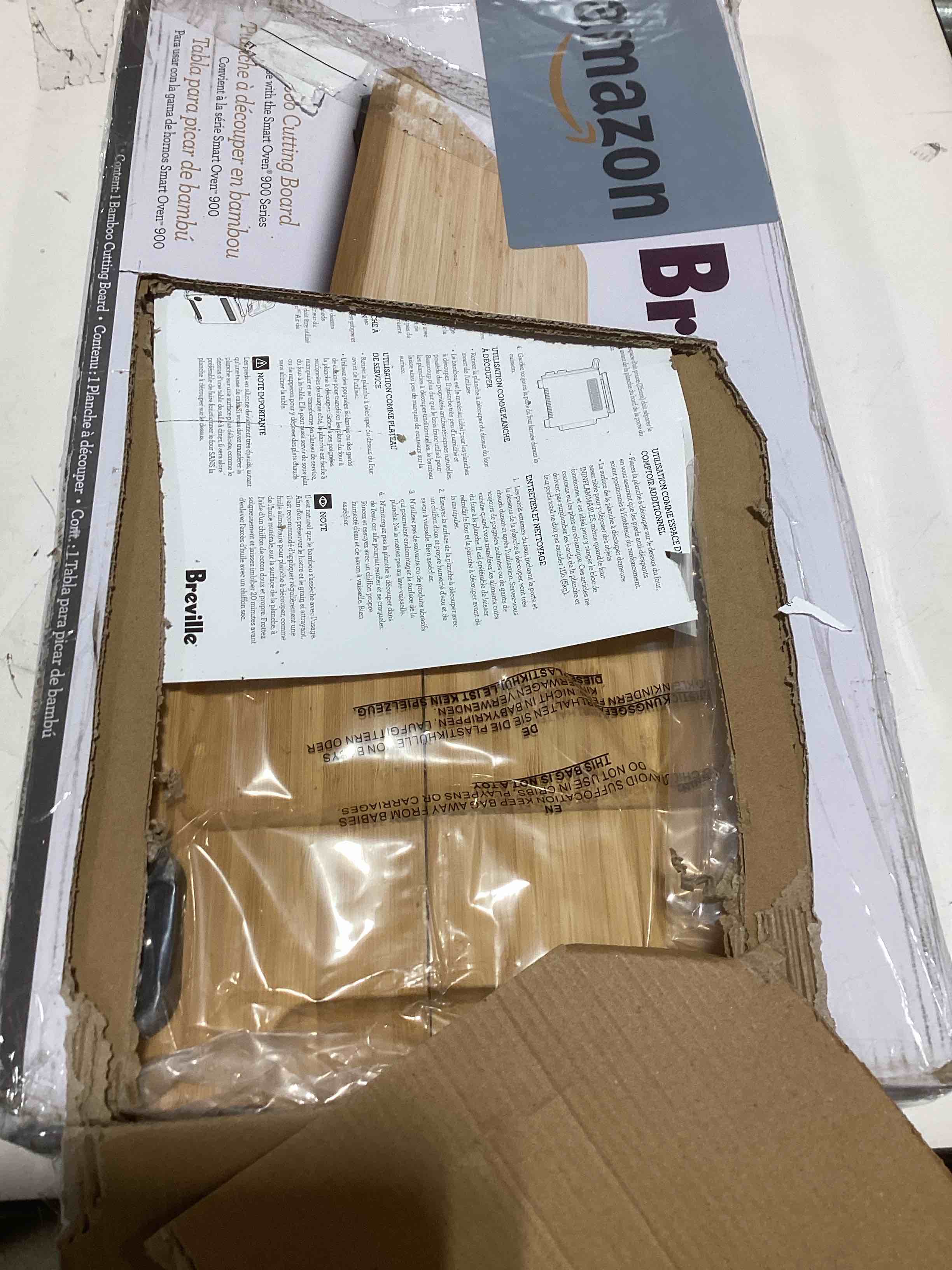 Condition photo showing As Is for brevile cutting board 