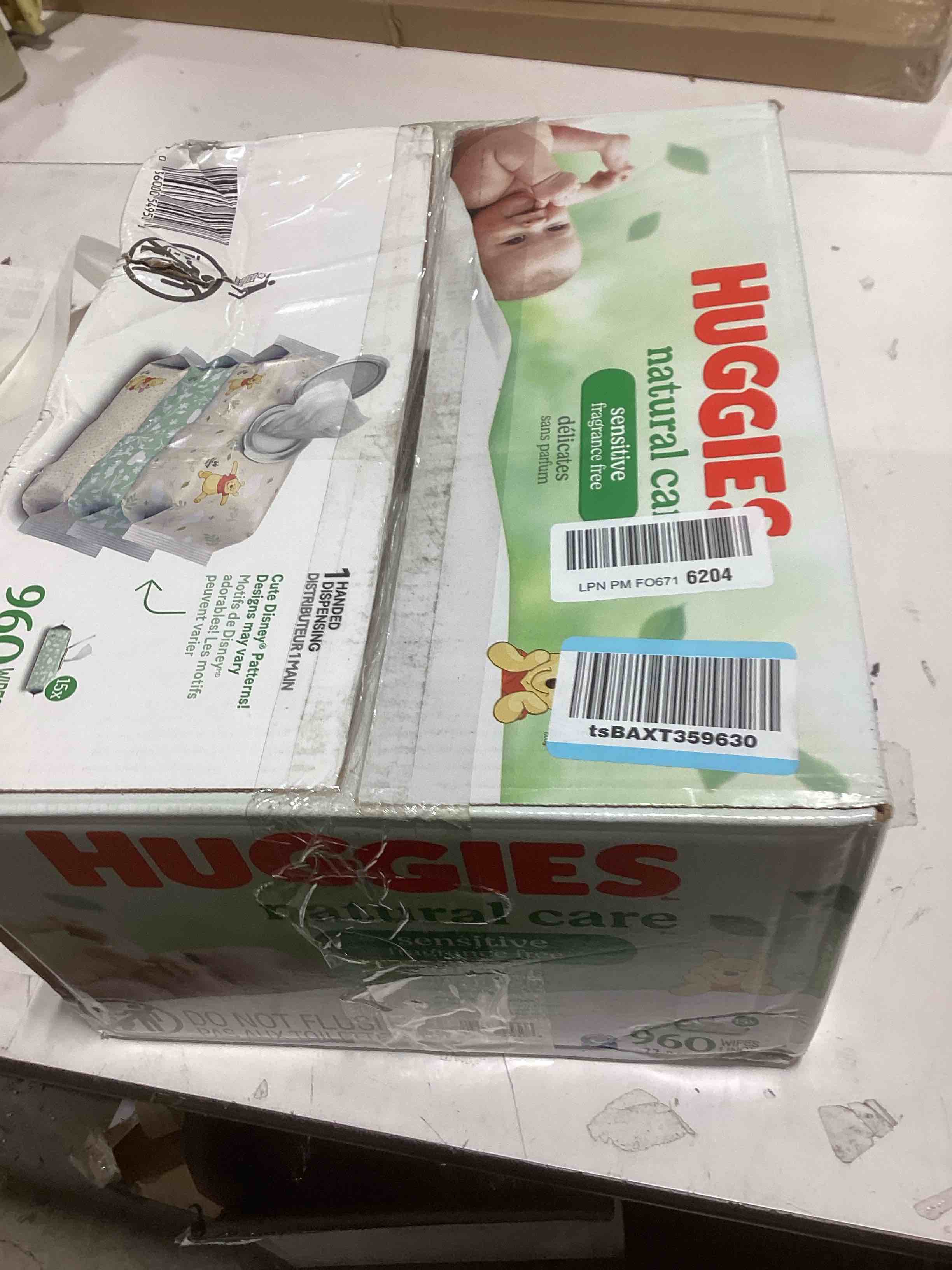 Condition photo showing As Is for huggies natural care sensitive baby wipes, unscented, hypoallergenic, 99% purified water, 15 flip-top packs (960 wipes total) 64 count (pack of 15)
