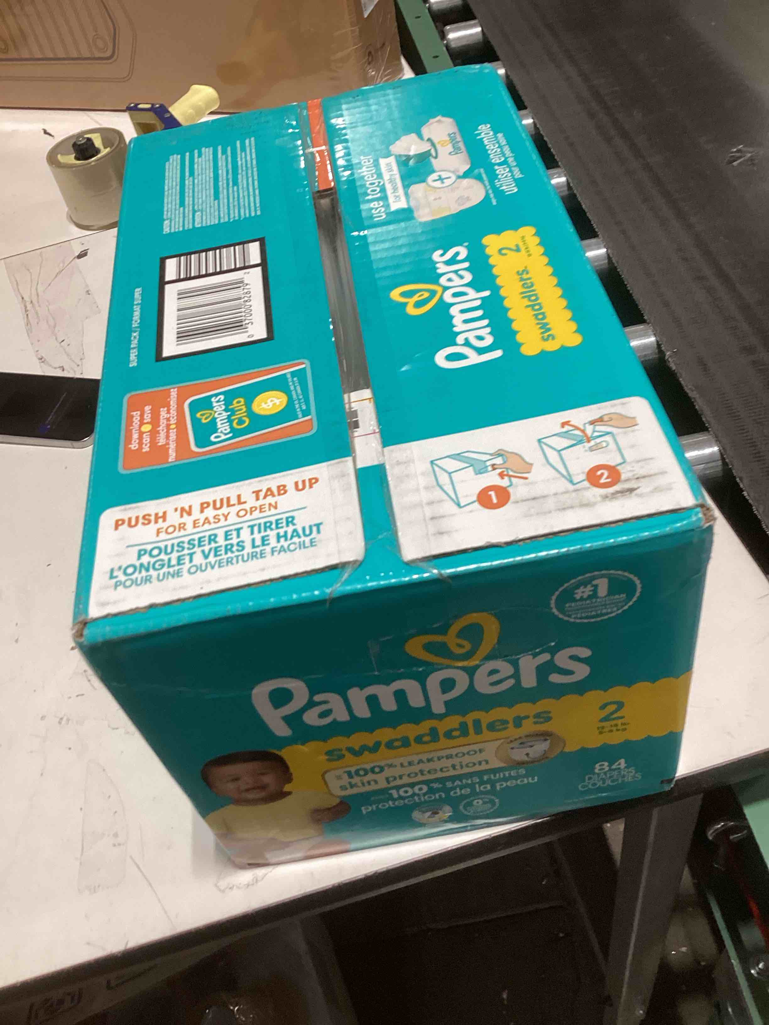 Condition photo showing As Is for Pampers Swaddlers Diapers, Size 2 (10-22 lbs), 84 Count, Absorbent, Keeps Baby Dry and Comfortable, Skin Safe Disposable Baby Diaper (Packaging May Vary) Size 2 84
