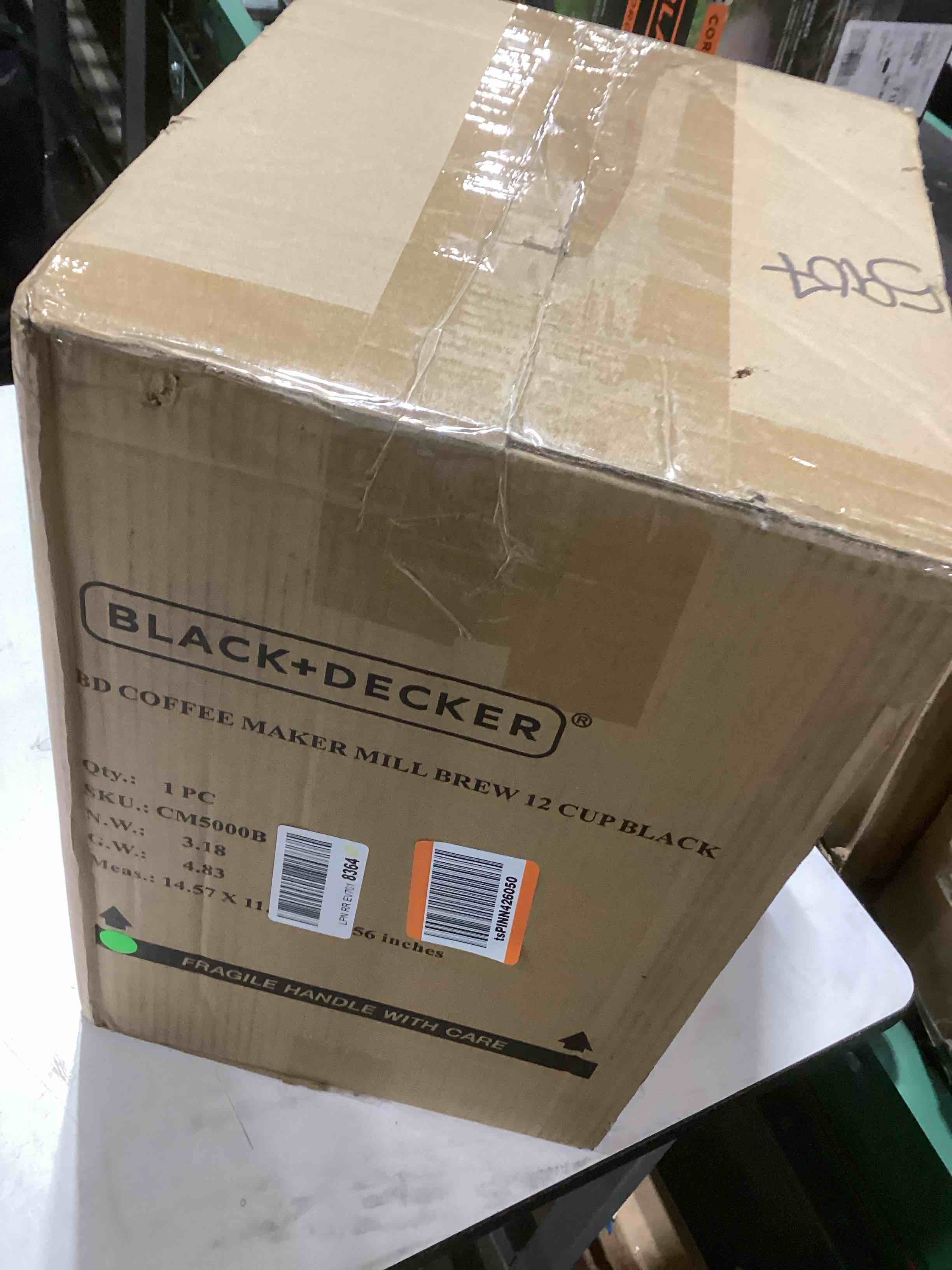 Condition photo showing As Is for BLACK+DECKER 12-Cup Mill and Brew Coffee Maker, Automatic Grind and Brew Drip Coffee Machine, Programmable, Sneak-A-Cup, Reusable Filter. 12-Cup Coffee System