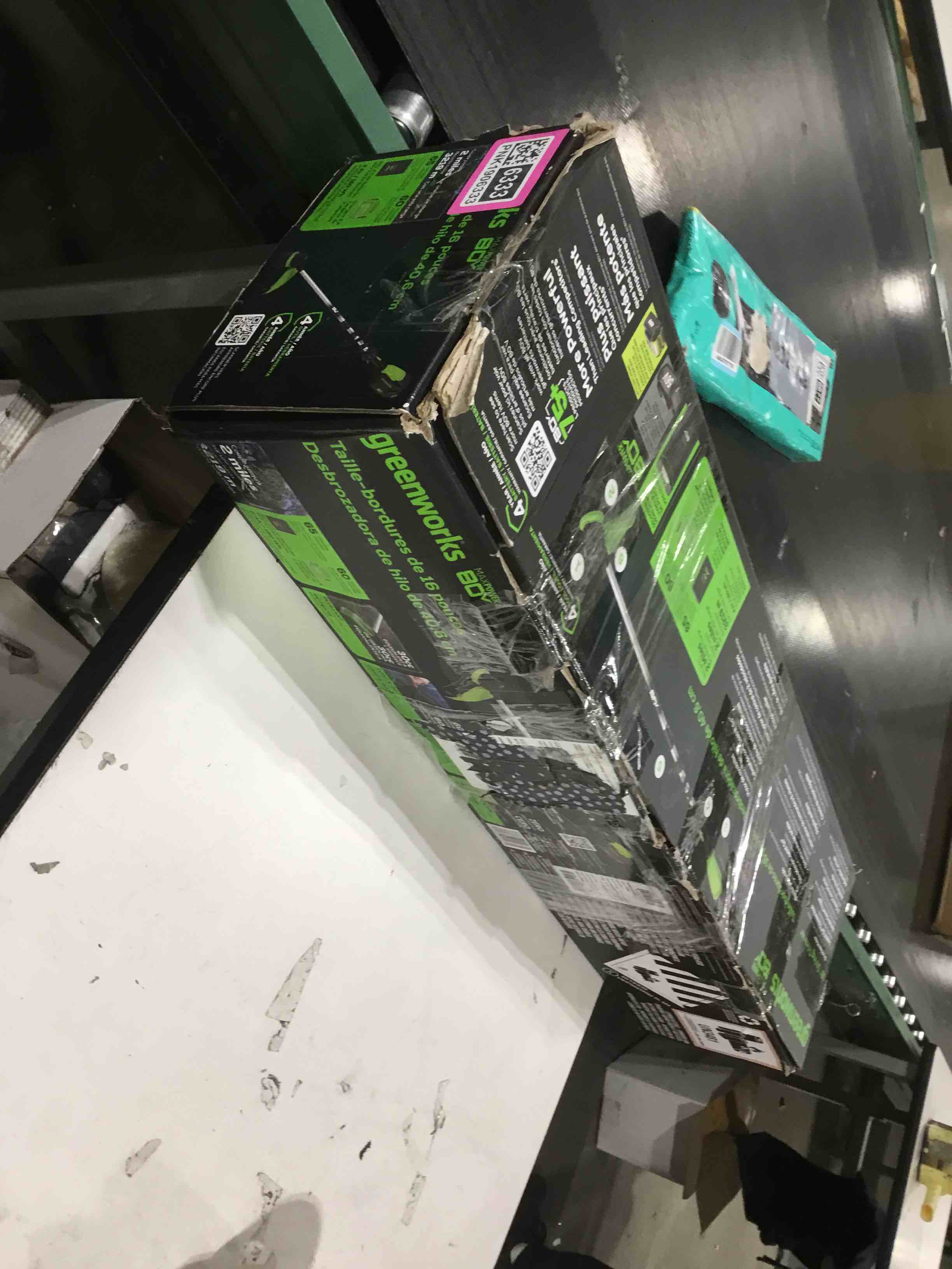 Condition photo showing As Is for Greenworks 80V 16" Brushless Cordless String Trimmer, 2.0Ah Battery and Charger Included 16" Brushless - Gen 2 (2.0Ah) Black