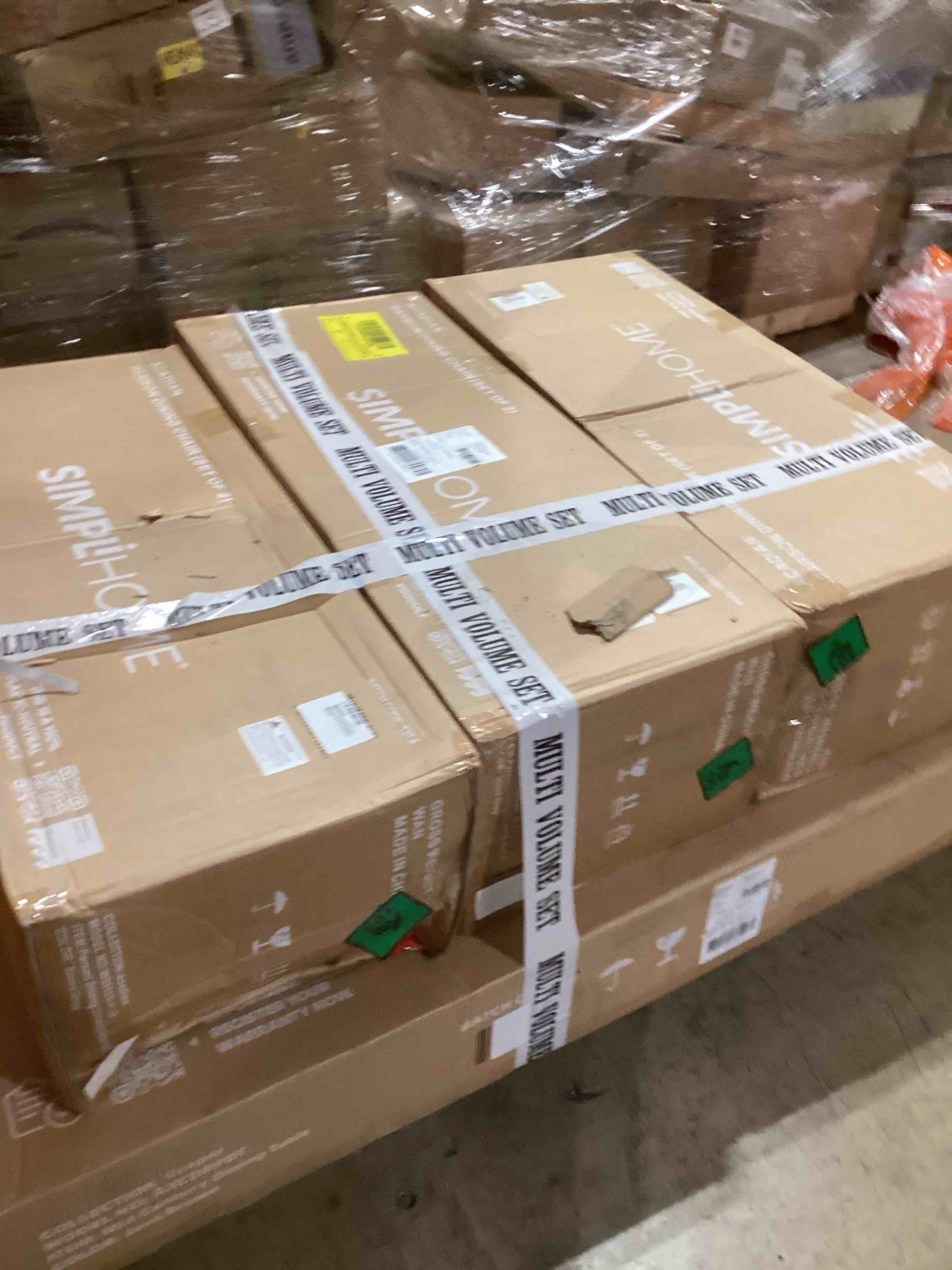 Condition photo showing Good Condition for SIMPLIHOME Acadian/Draper Contemporary Modern 7 Pc Dining Set with 6 Upholstered Parson Chairs in Stone Grey Faux Leather and 66 inch Wide Table for The Dining Room and Kitchen