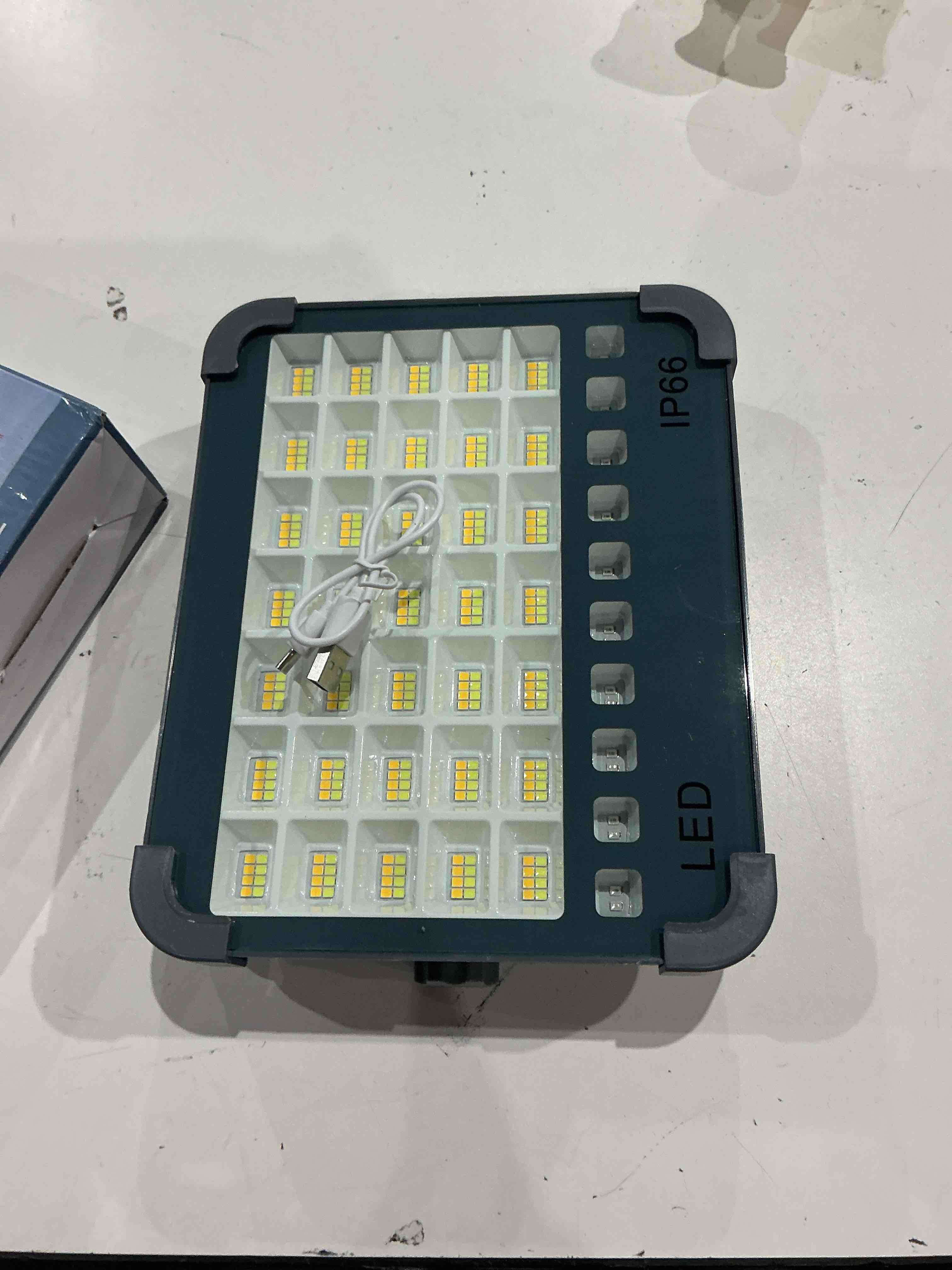 kh solar led work light, portable rechargeable flood light with usb charging, 5 lighting modes, ip66 waterproof, solar emergency lamp for camping, garage, farm, hotel & power outage (grey)
