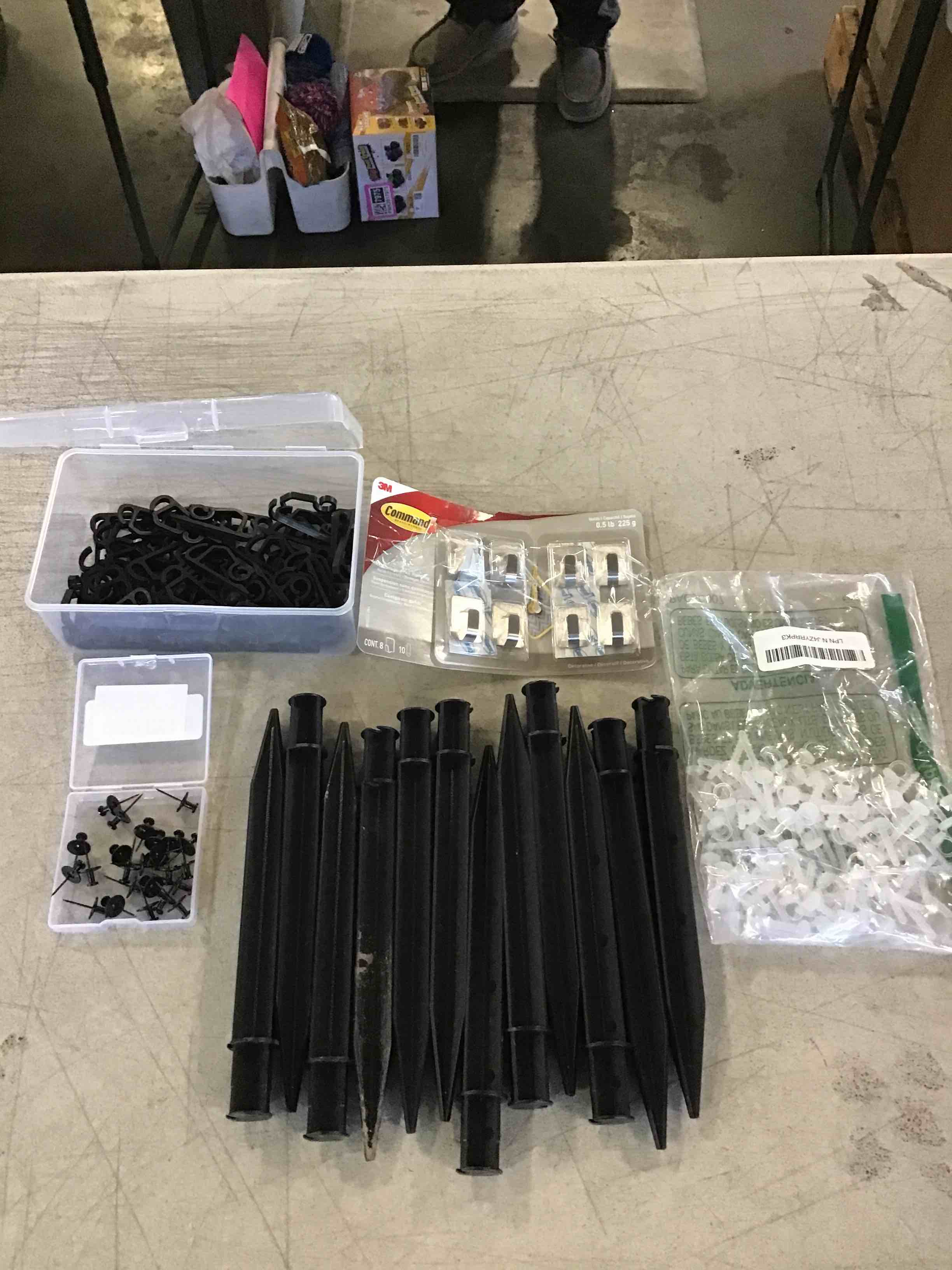 miscellaneous items :: Push pins , yard stakes, Christmas light hangers ( black and clear, ) command hooks (Crome )