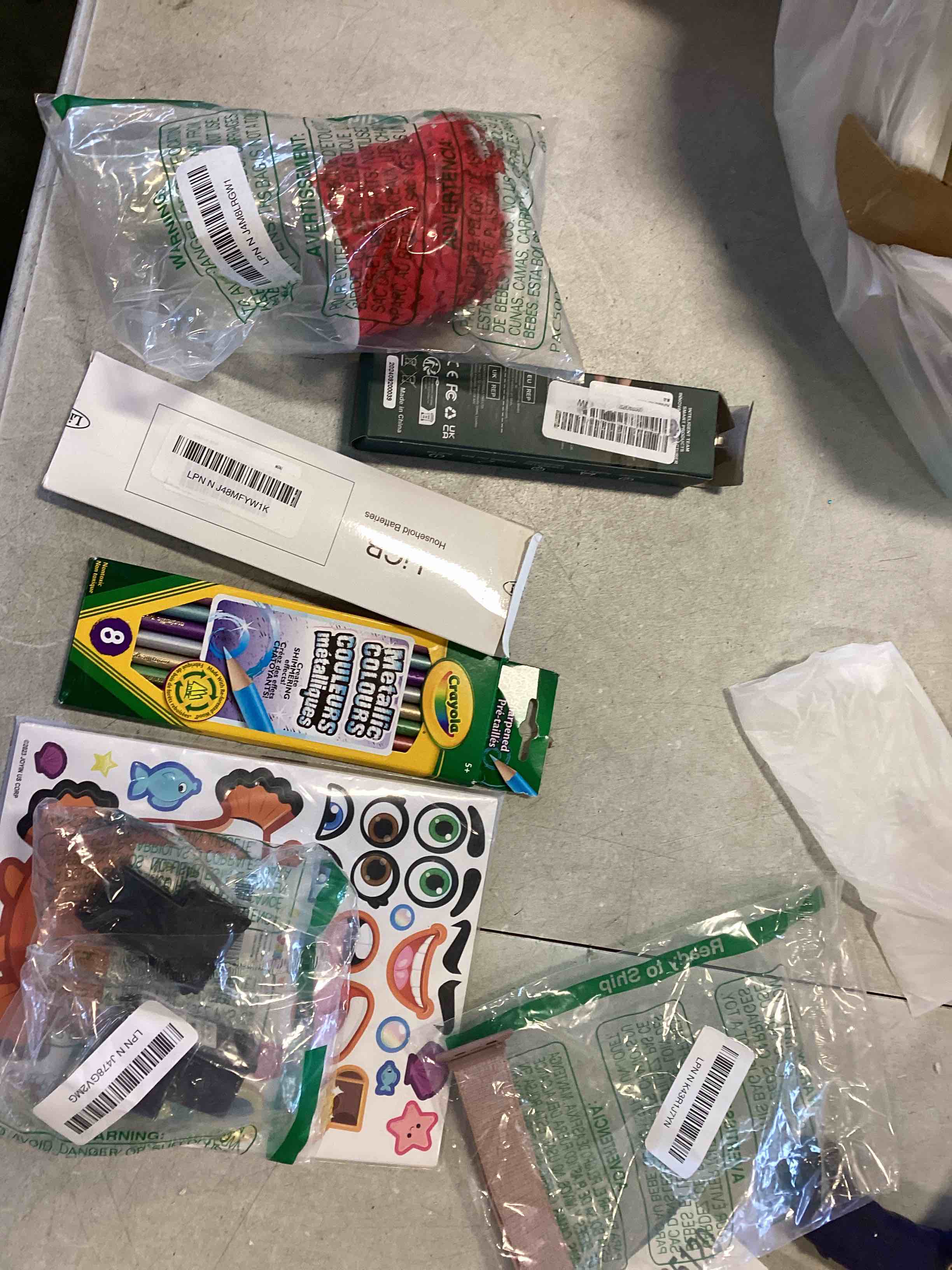 Assortment of products Various styles includes Decals Colors Batteries Printer ink