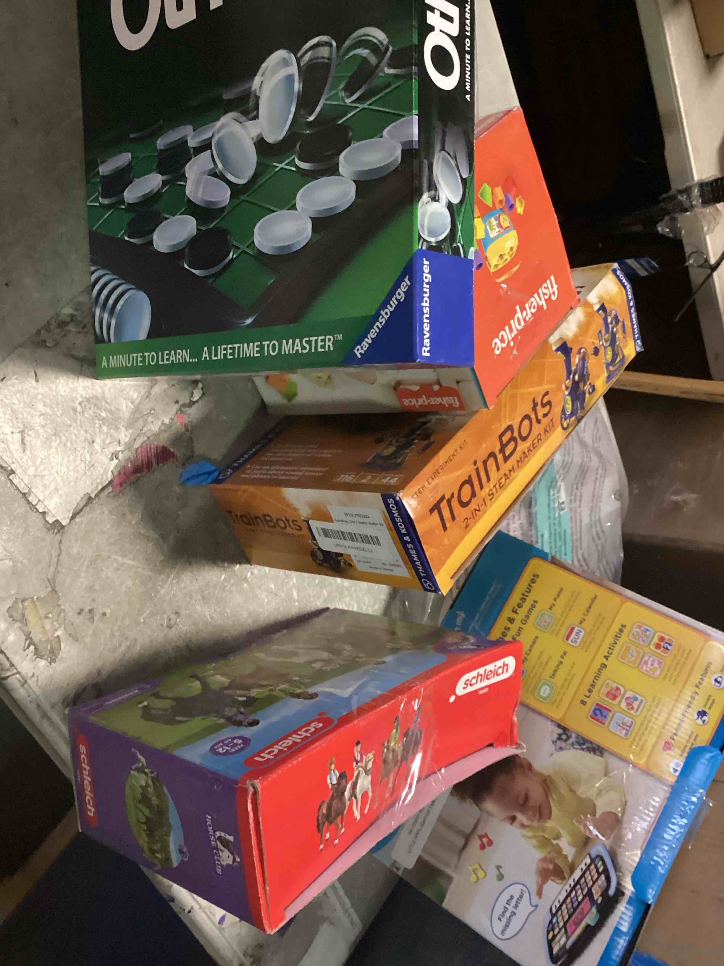  assortment of toys for kids boys and girls  of different ages that includes INCOHEARENT, MAIN STREET VILLAGE 1000 piece, CHARLES WYSHOCKI AND MORE