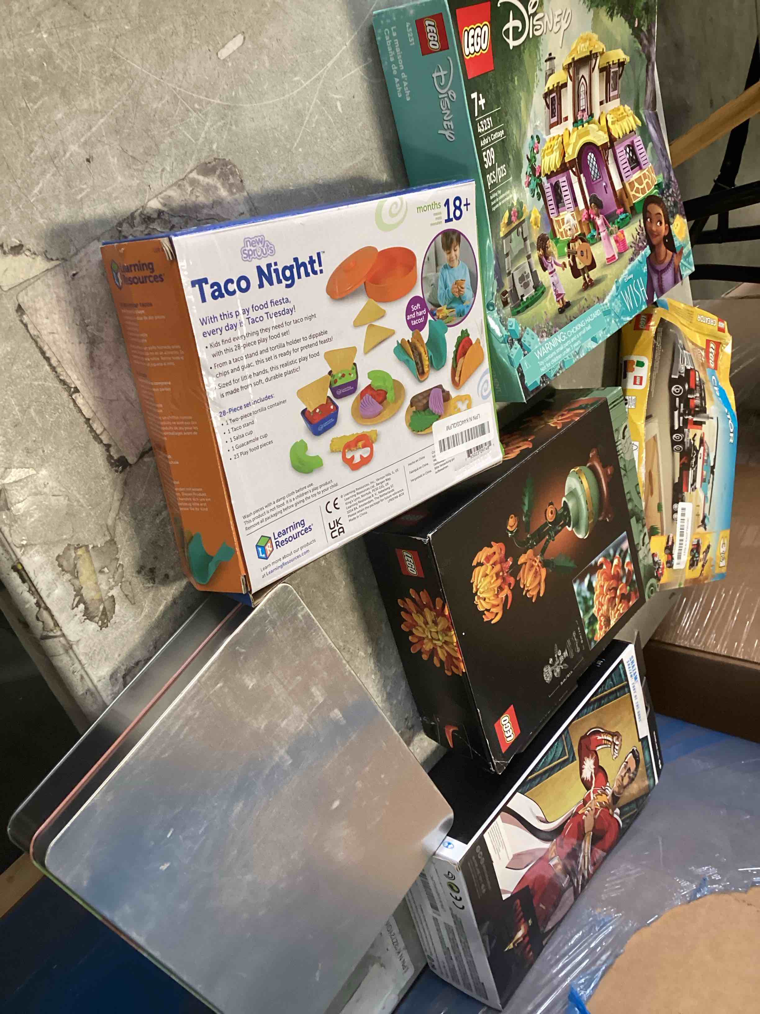  assortment of toys for kids boys and girls  of different ages that includes INCOHEARENT, MAIN STREET VILLAGE 1000 piece, CHARLES WYSHOCKI AND MORE