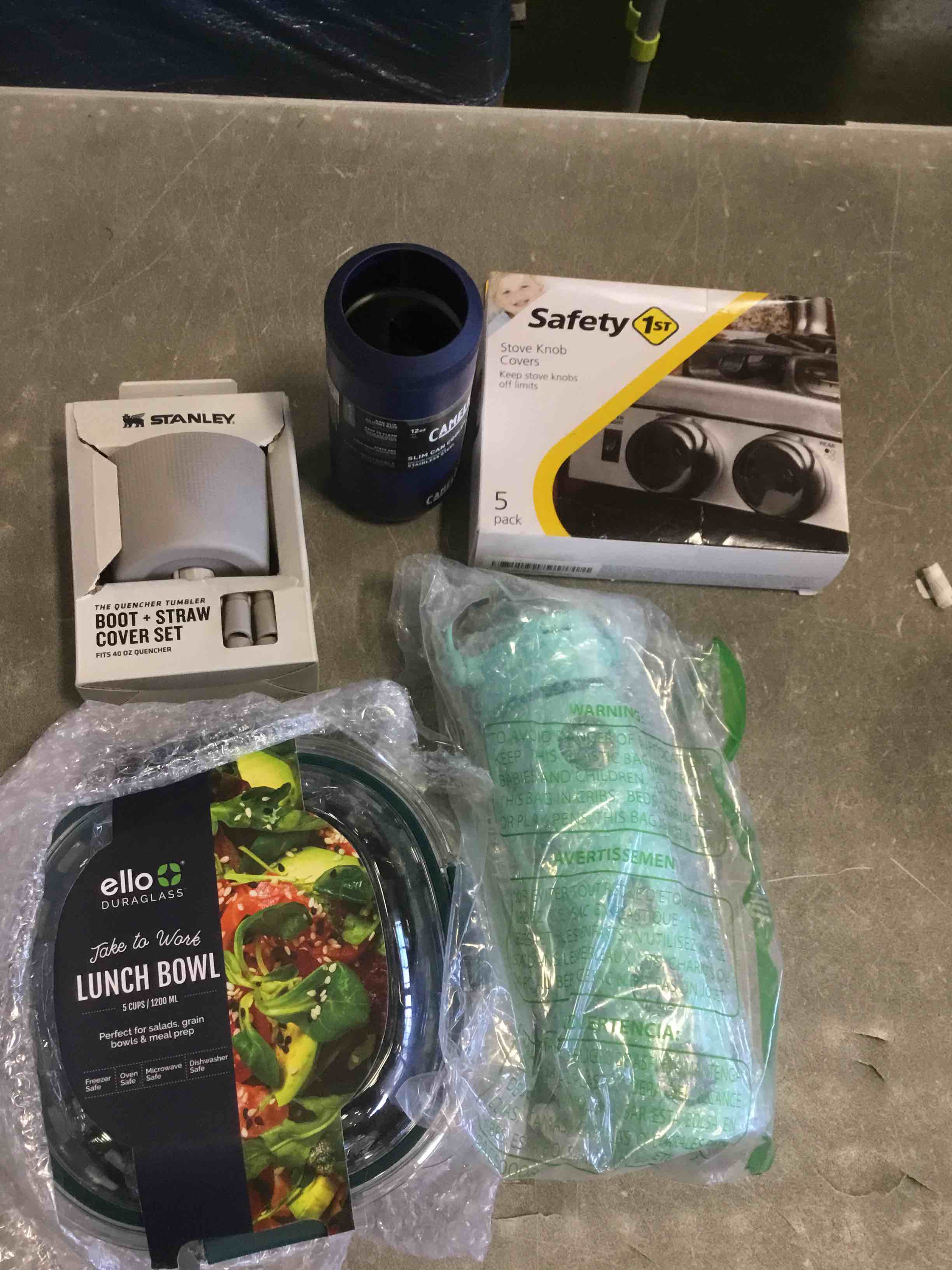 assorted of different products included ( lunch bowl , stanley boot straw cover set , safety stove knob covers , and more ) 