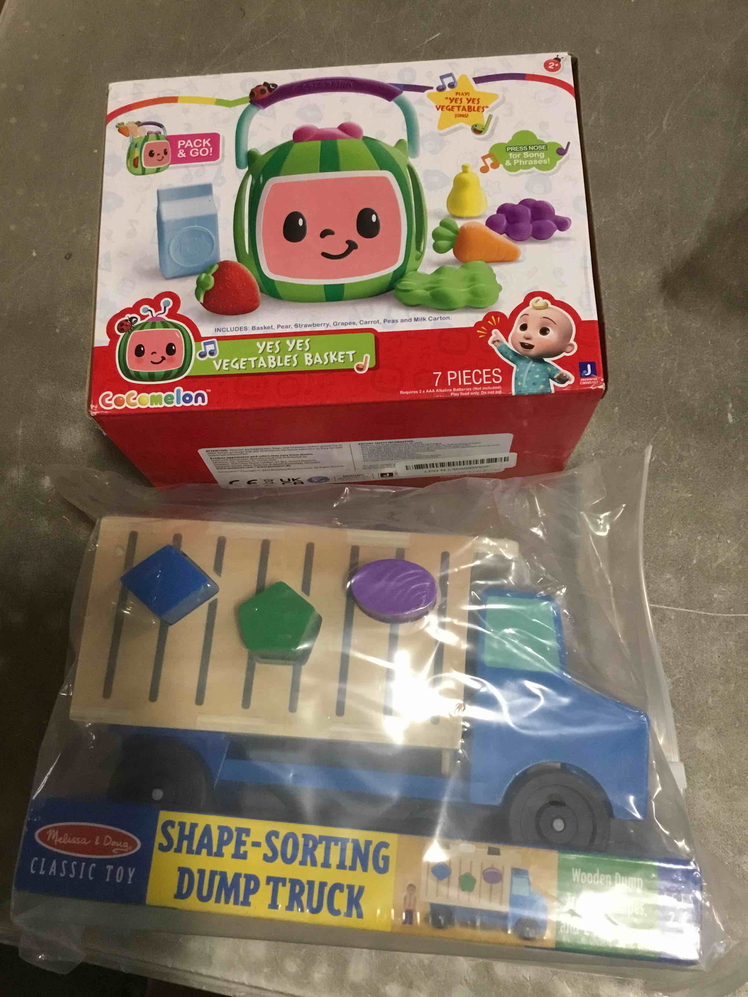 assorted of toys included ( cocomelon yes yes vegetables basket , shape-sorting dump truck ) 