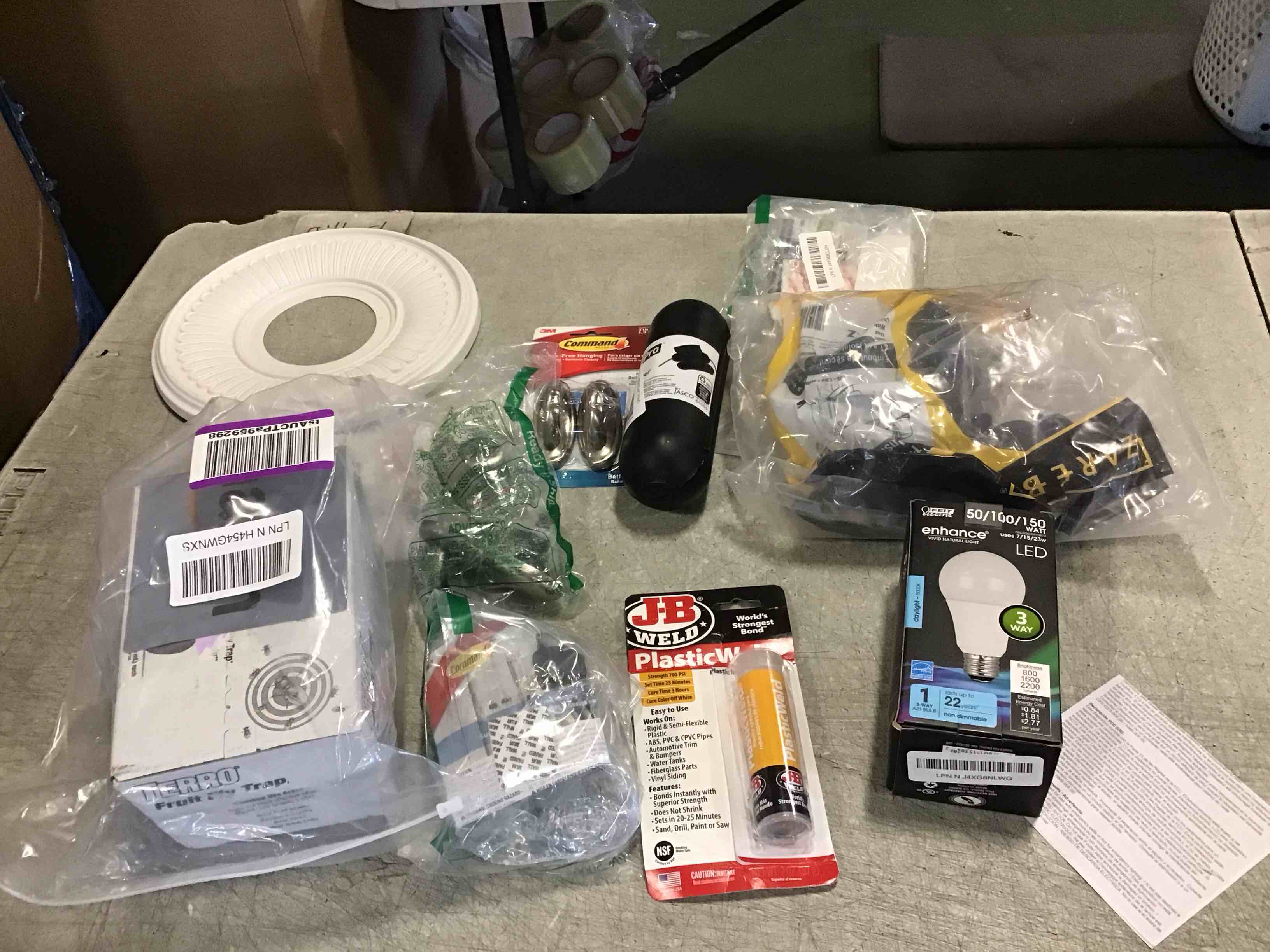 ASSORTED OF MICSELLANIUS INCLUDED,FEIT ELECTRIC ENHANCE ,PLASTIC WELD , COMMAND DAMAGE GREE HANGING AND MORE ( MAY VARIE PRODUCTSj