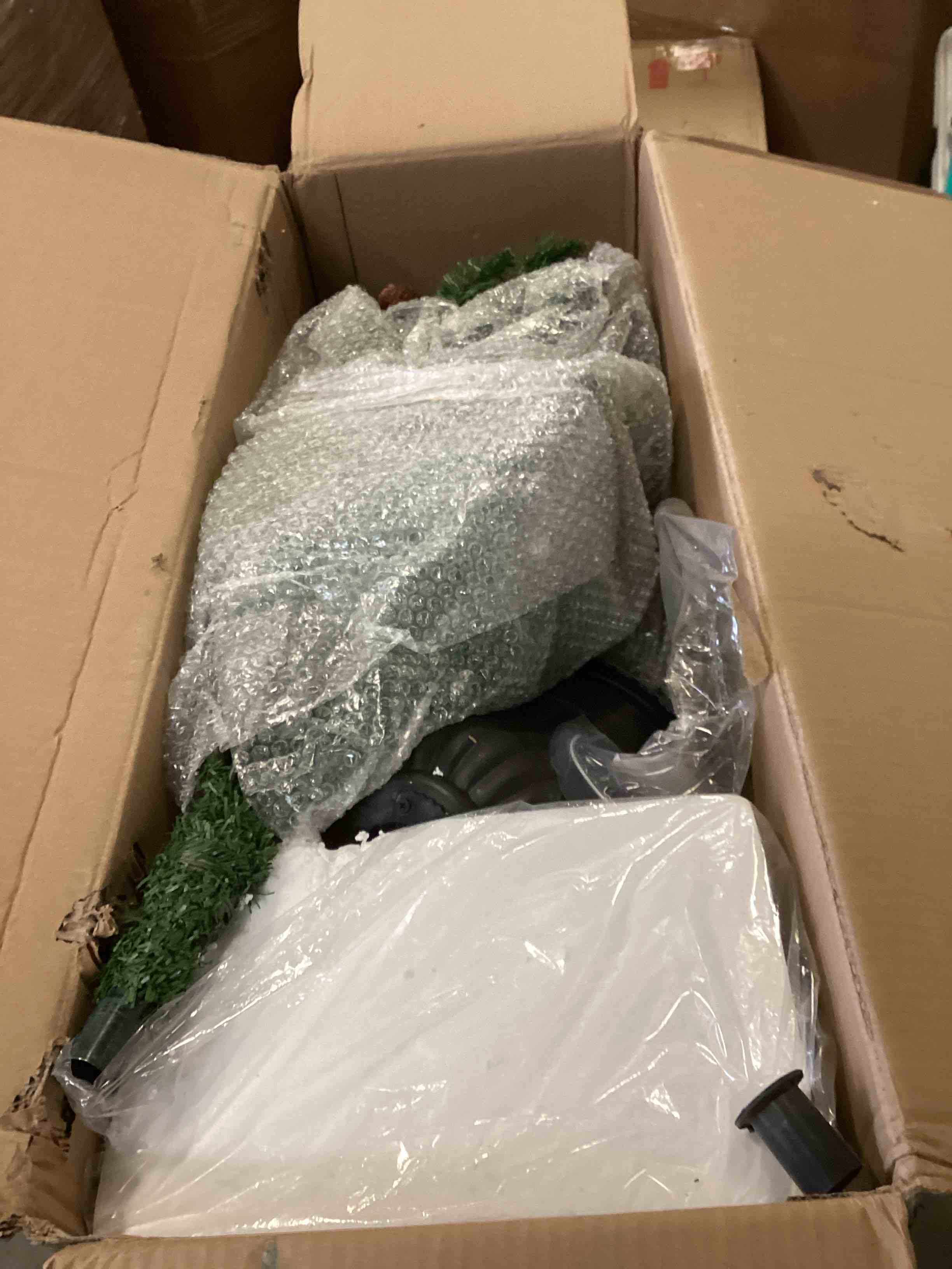 Condition photo showing As Is for The Potted 5' Prelit Pinecone Spruce