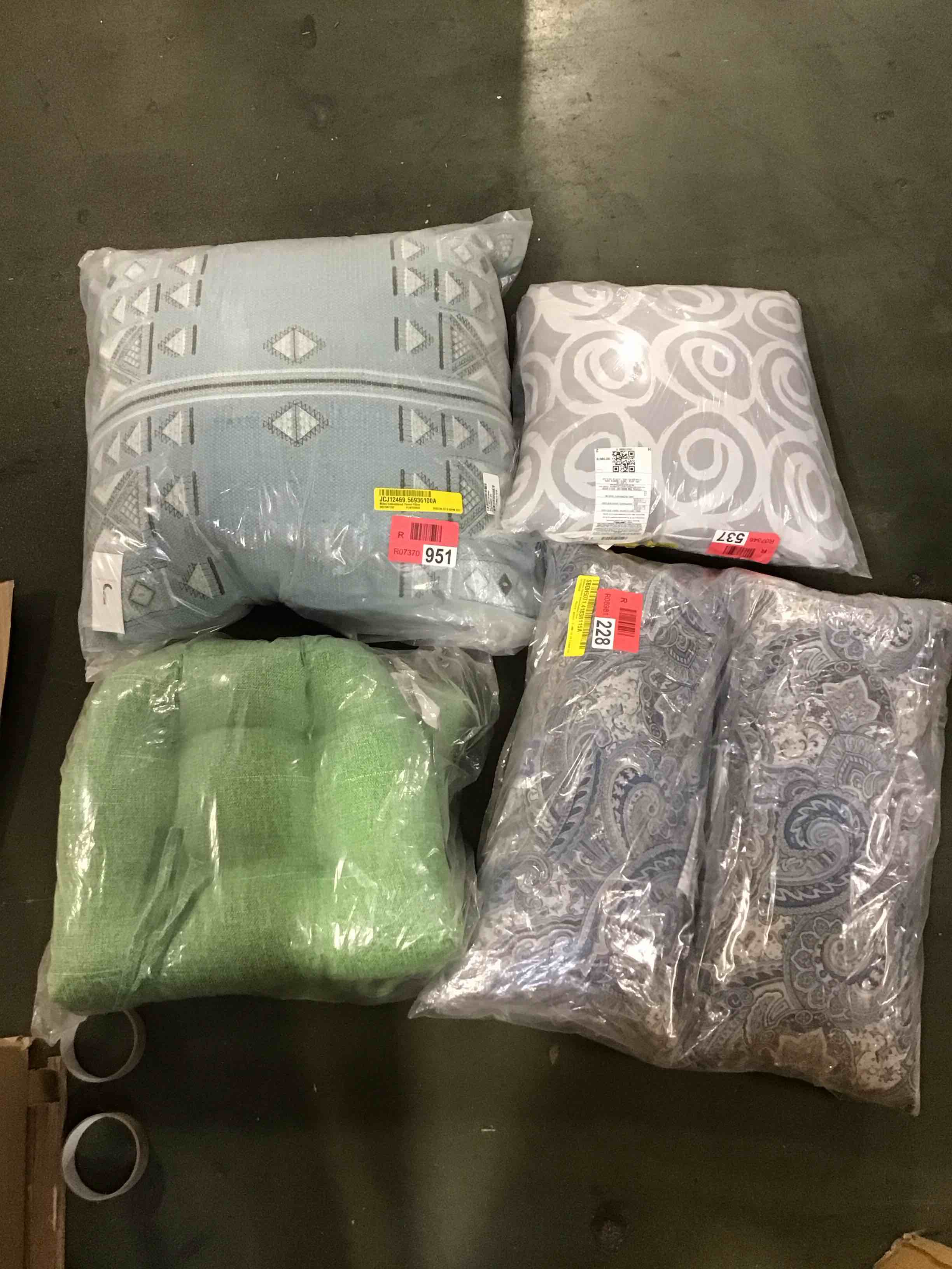 assorted throw pillows and cushions 