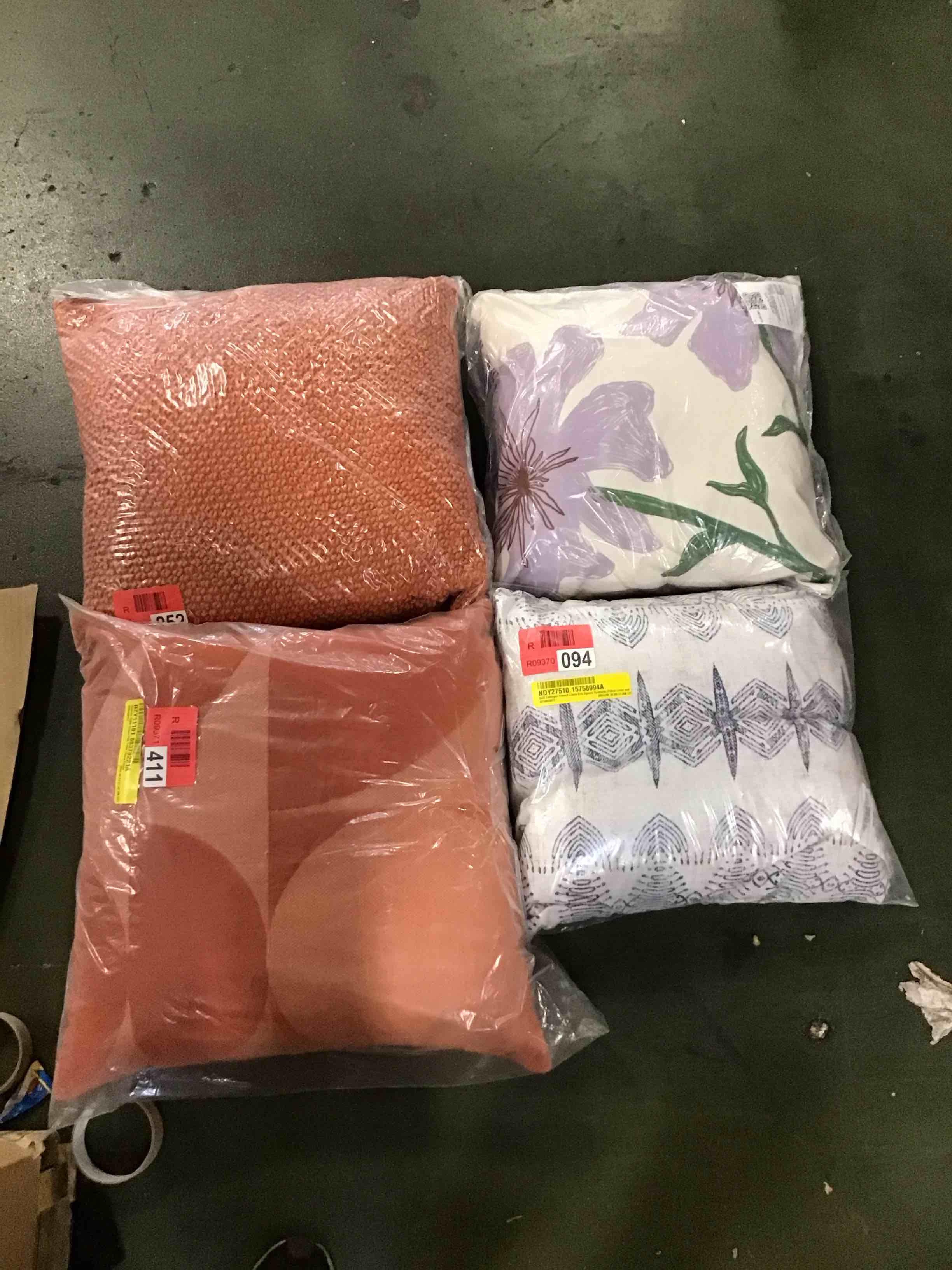 assorted size and style throw pillows 