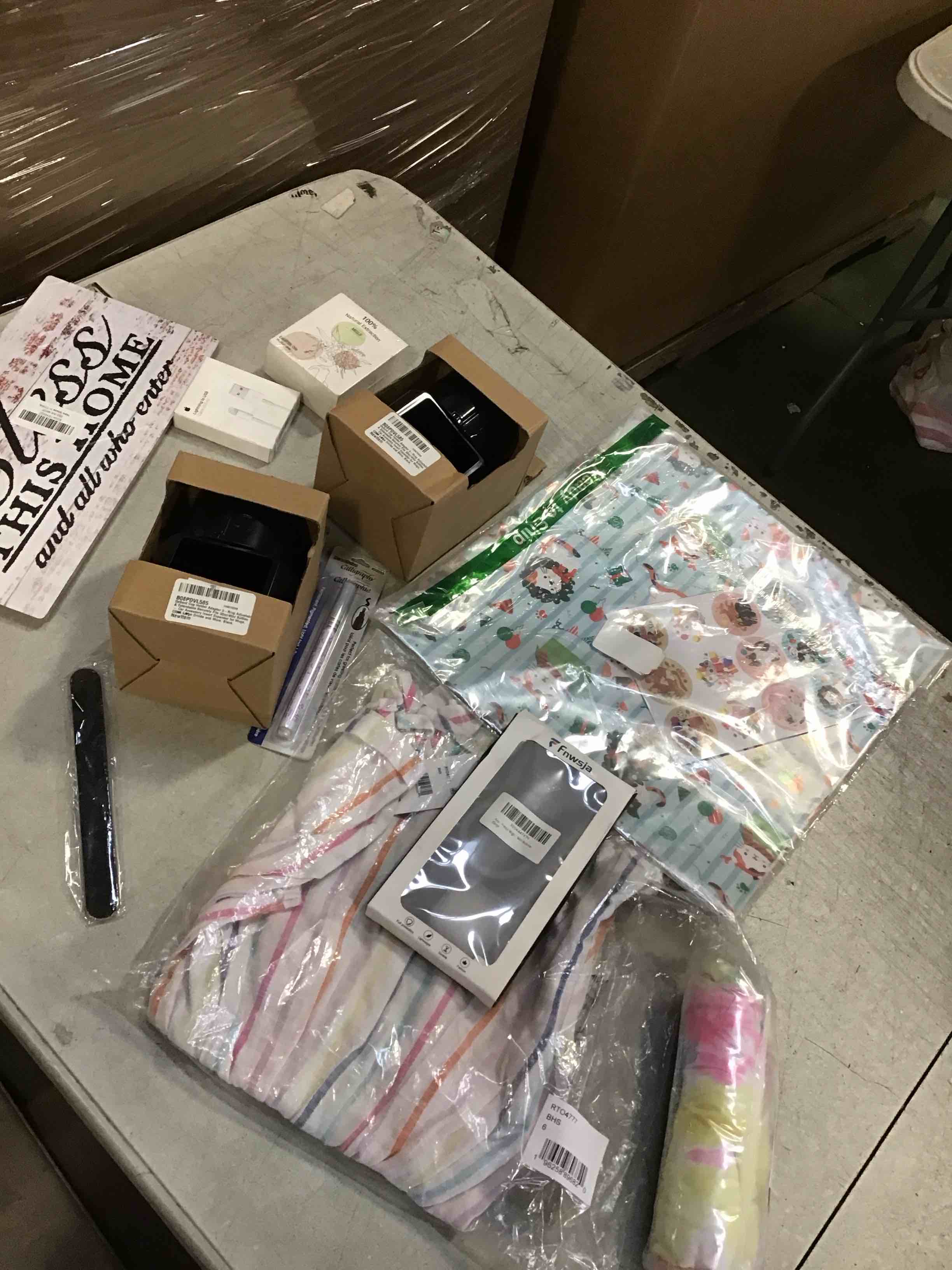 ASSORTED OF MICSELLANIUS INCLUDED, PAPER MERRY CHRISTMAS, CABLE CHARGED, CASE OF IPHONE,AND MORE 