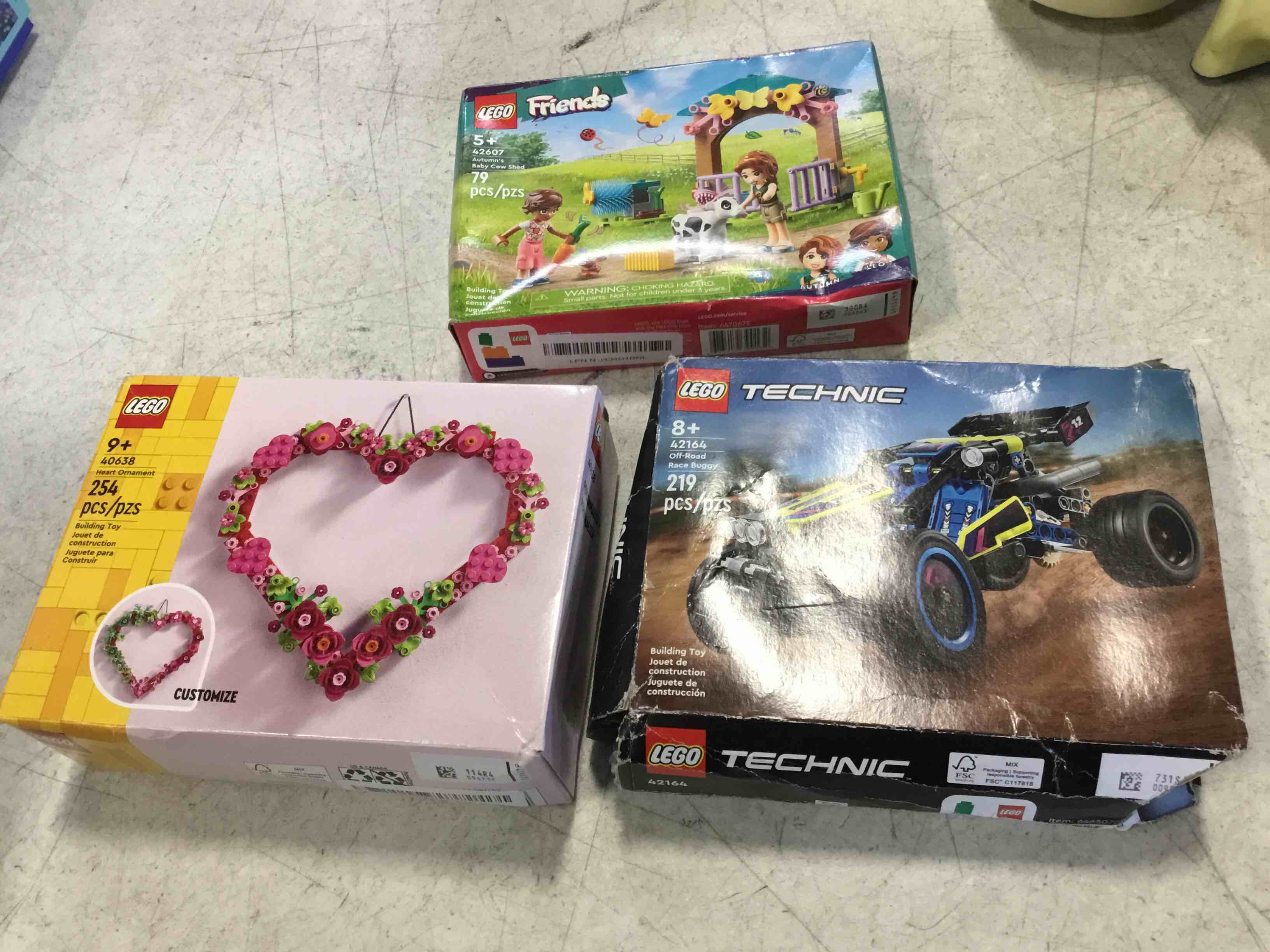 Legos Assorted includes Heart ornaments 254 pcs, Race Buggy 219 pcs baby cow shed 79 pcs