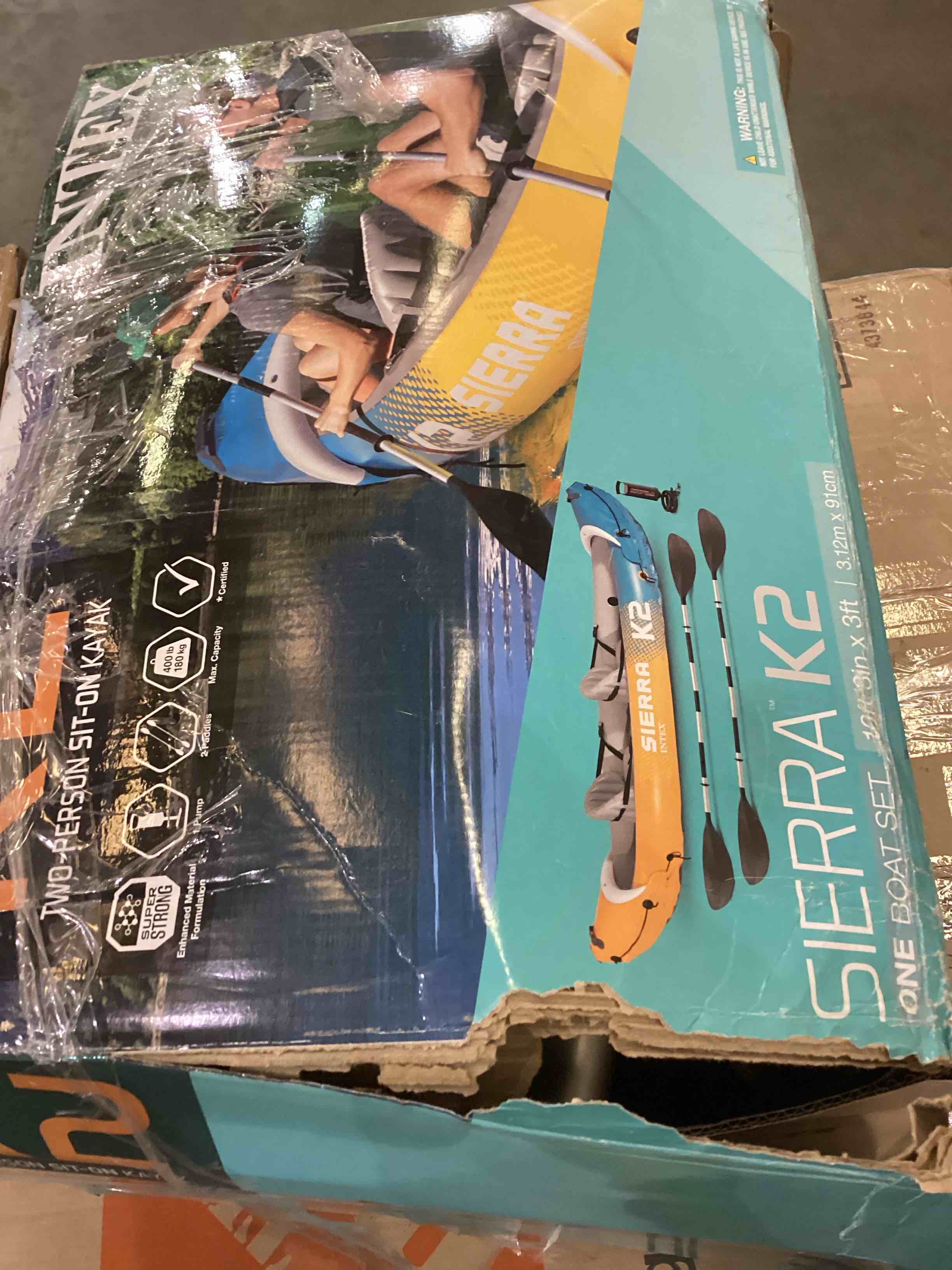 two person sit on kayak