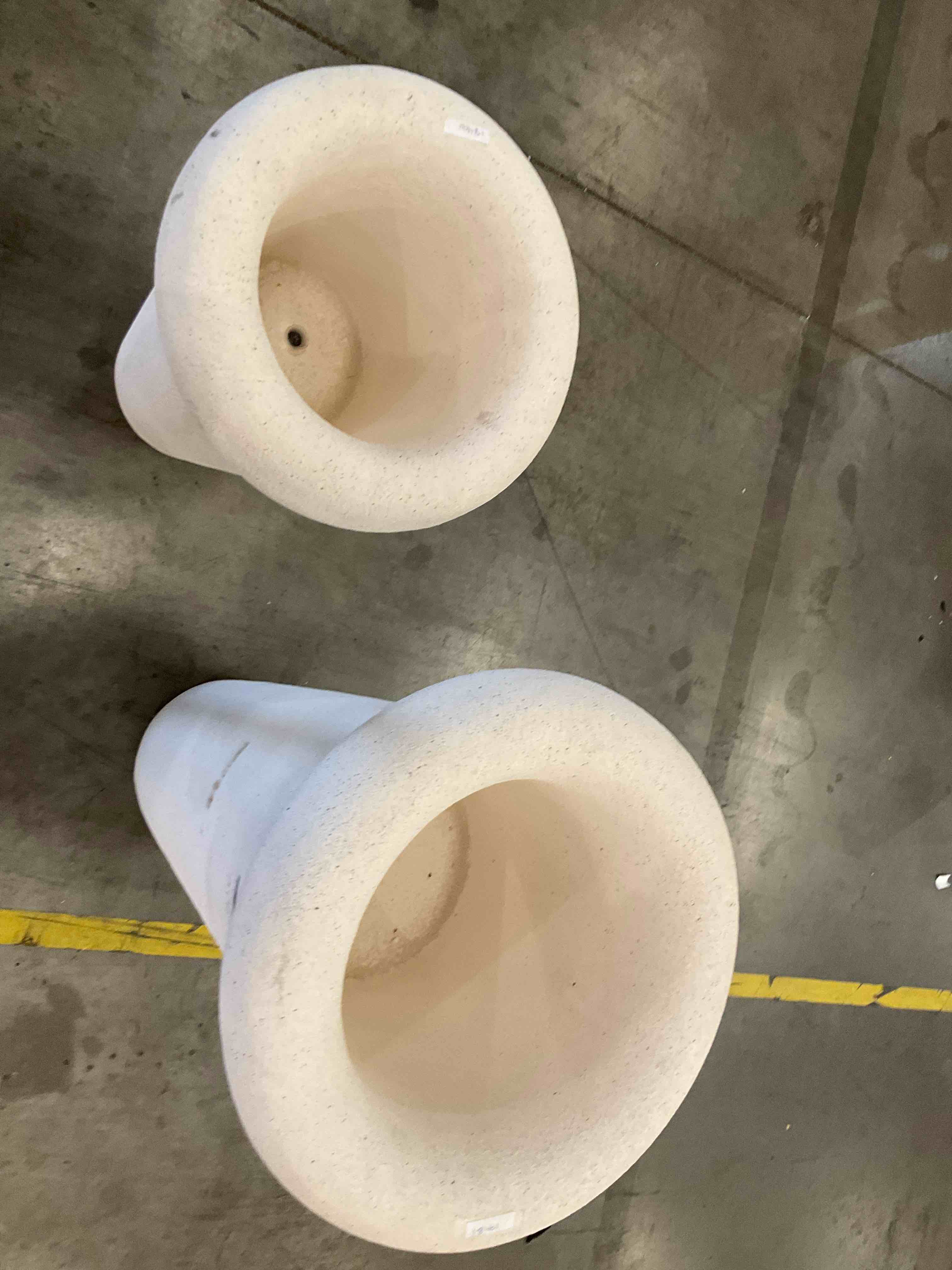 two white plant pots 