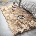 Malaiah shag faux sheepskin fur area rug in beige  