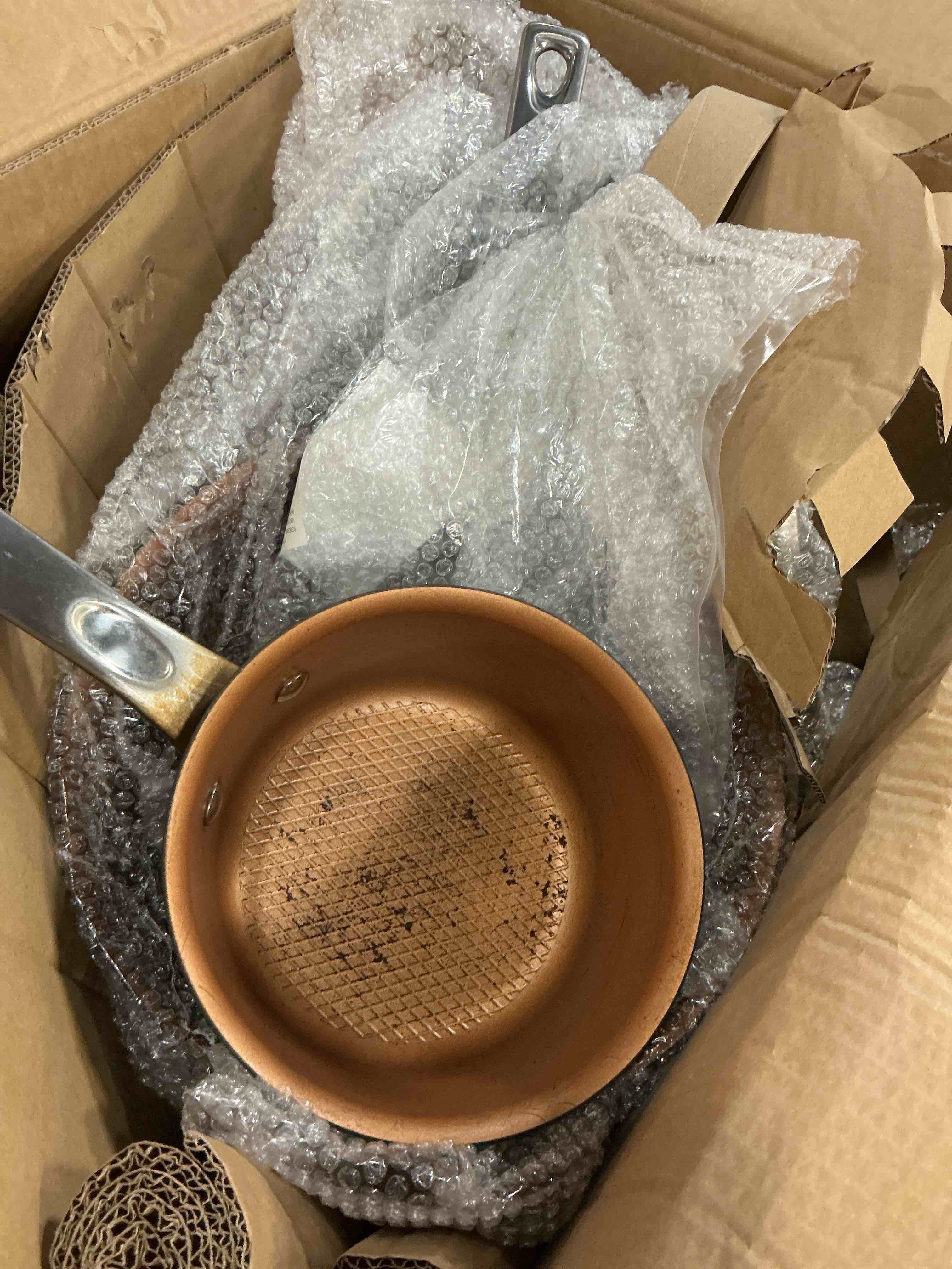 Condition photo showing As Is for CAROTE 21Pcs Pots and Pans Set, Nonstick Cookware Sets, White Granite Induction Cookware Non Stick Cooking Set w/Frying Pans & Saucepans(PFOS, PFOA Free) Cream White 21 Piece (color may vary ours is grey)