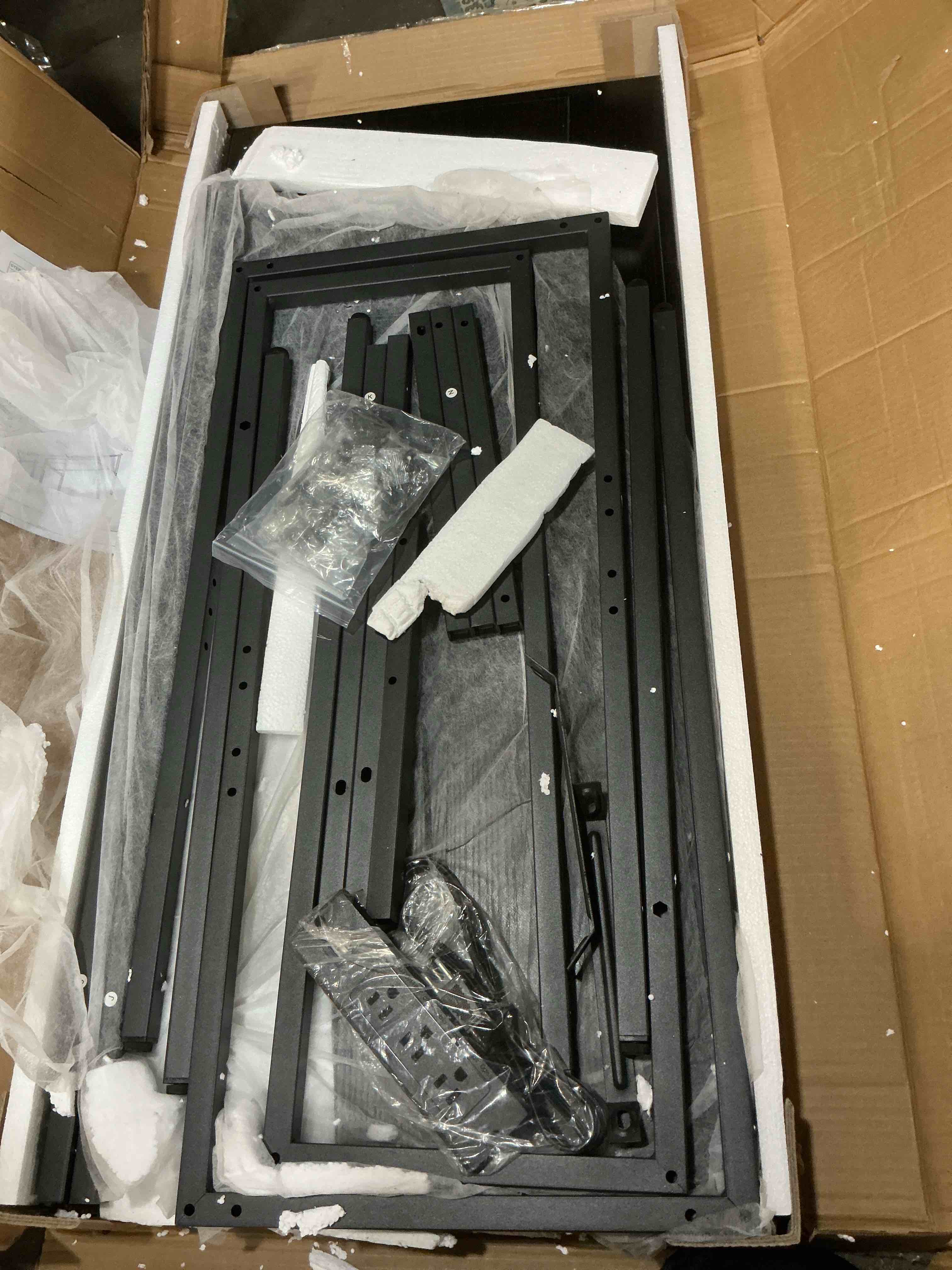 Condition photo showing Good Condition for Unikito Reversible L Shaped Desk with Magic Power Outlets and USB Charging Ports, Sturdy Corner Computer Desk with Storage Shelves, Gaming Table Home Office Desk, Easy to Assemble, Black Desk Black