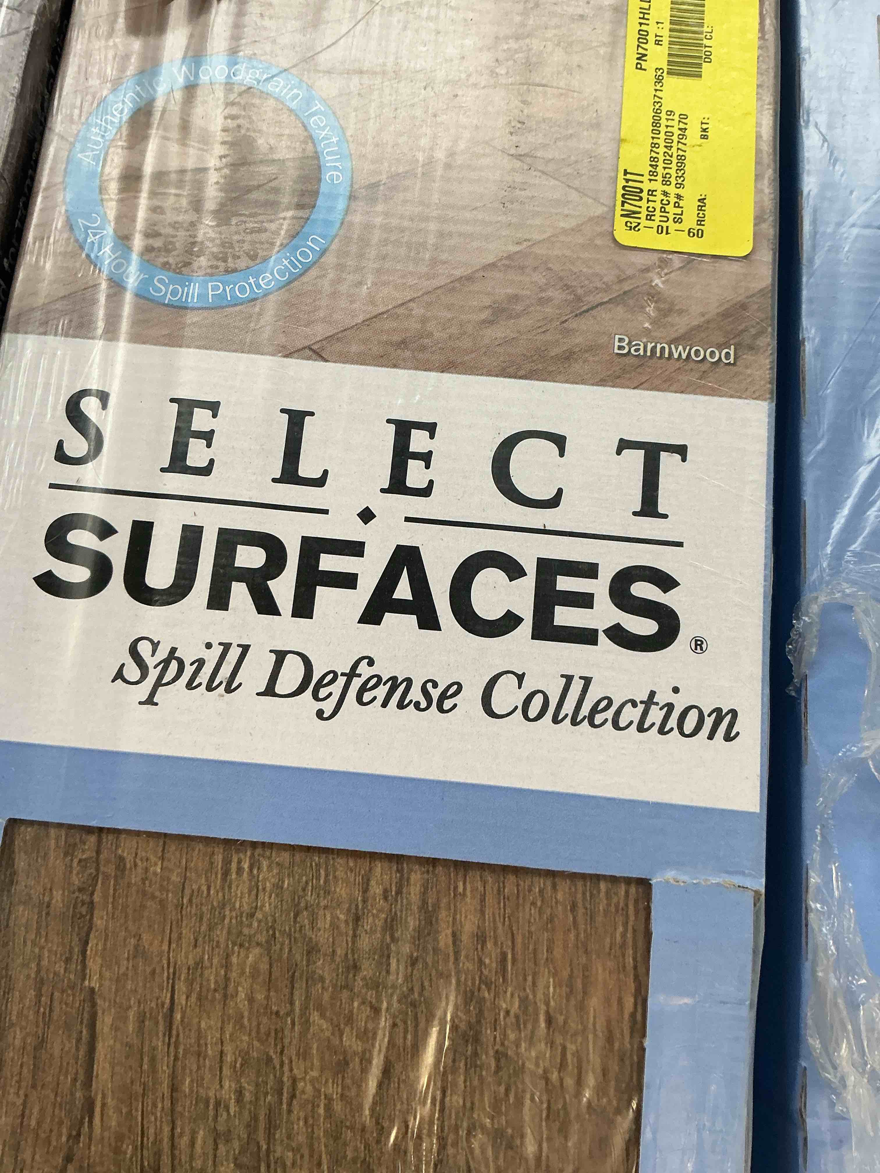Condition photo showing As Is for Select Surfaces SCLMF0486 Barnwood Spill Defense Laminate Flooring 12.34 sq.ft per box )