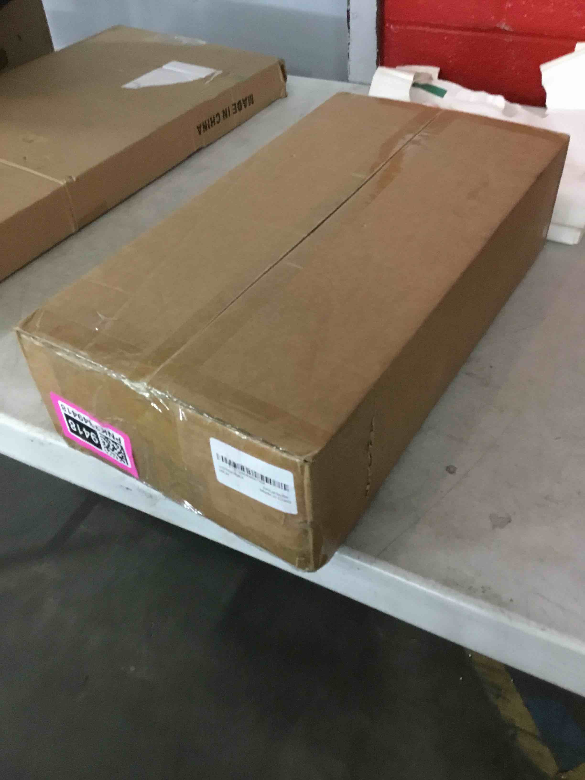 Condition photo showing Good Condition for a-karck universal exhaust muffler 2.25" offset inlet 2.25" center outlet, 17.3" overall length alumi