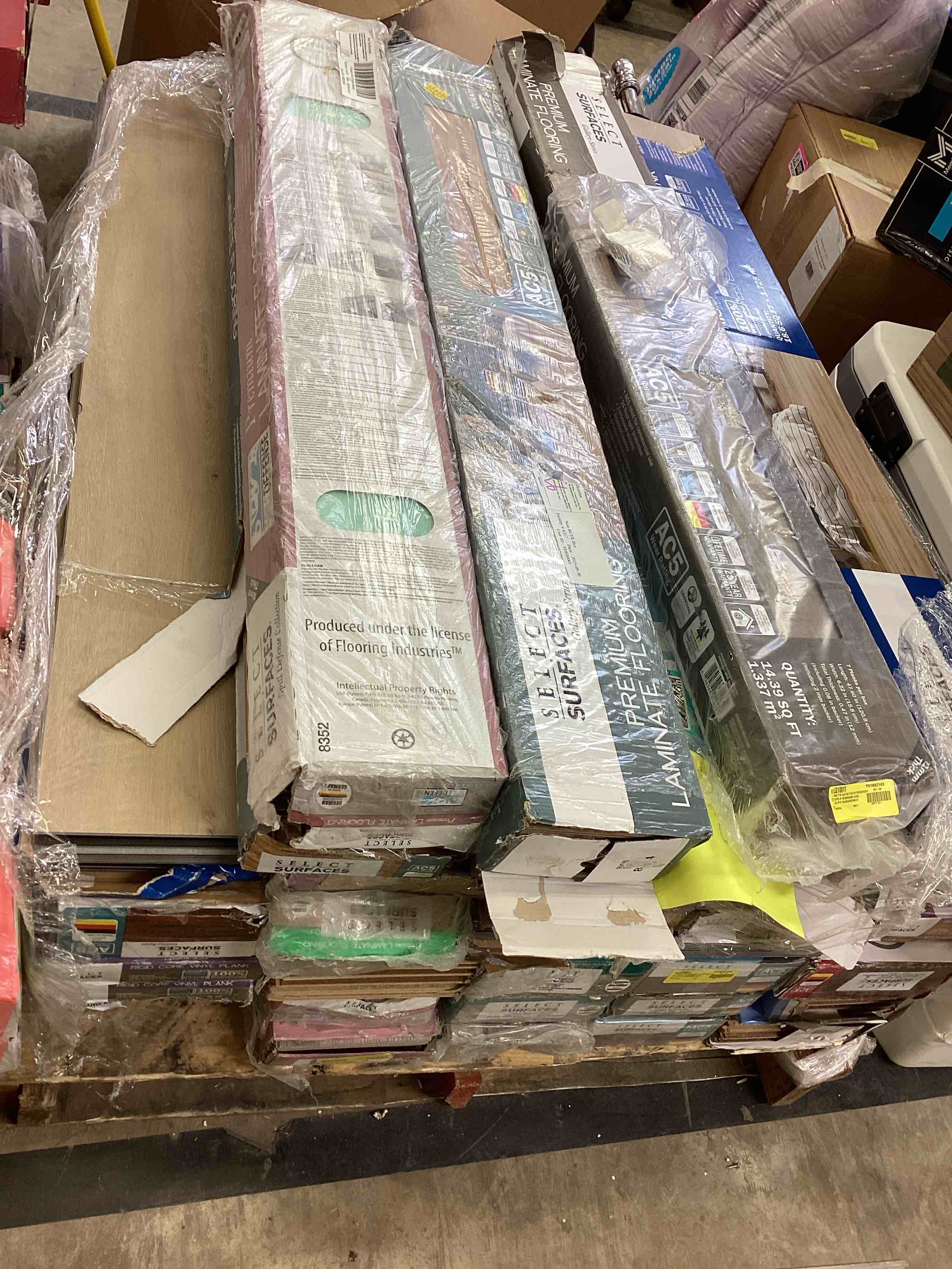 Assorted of 35 boxes laminate flooring, different colors and sizes. 