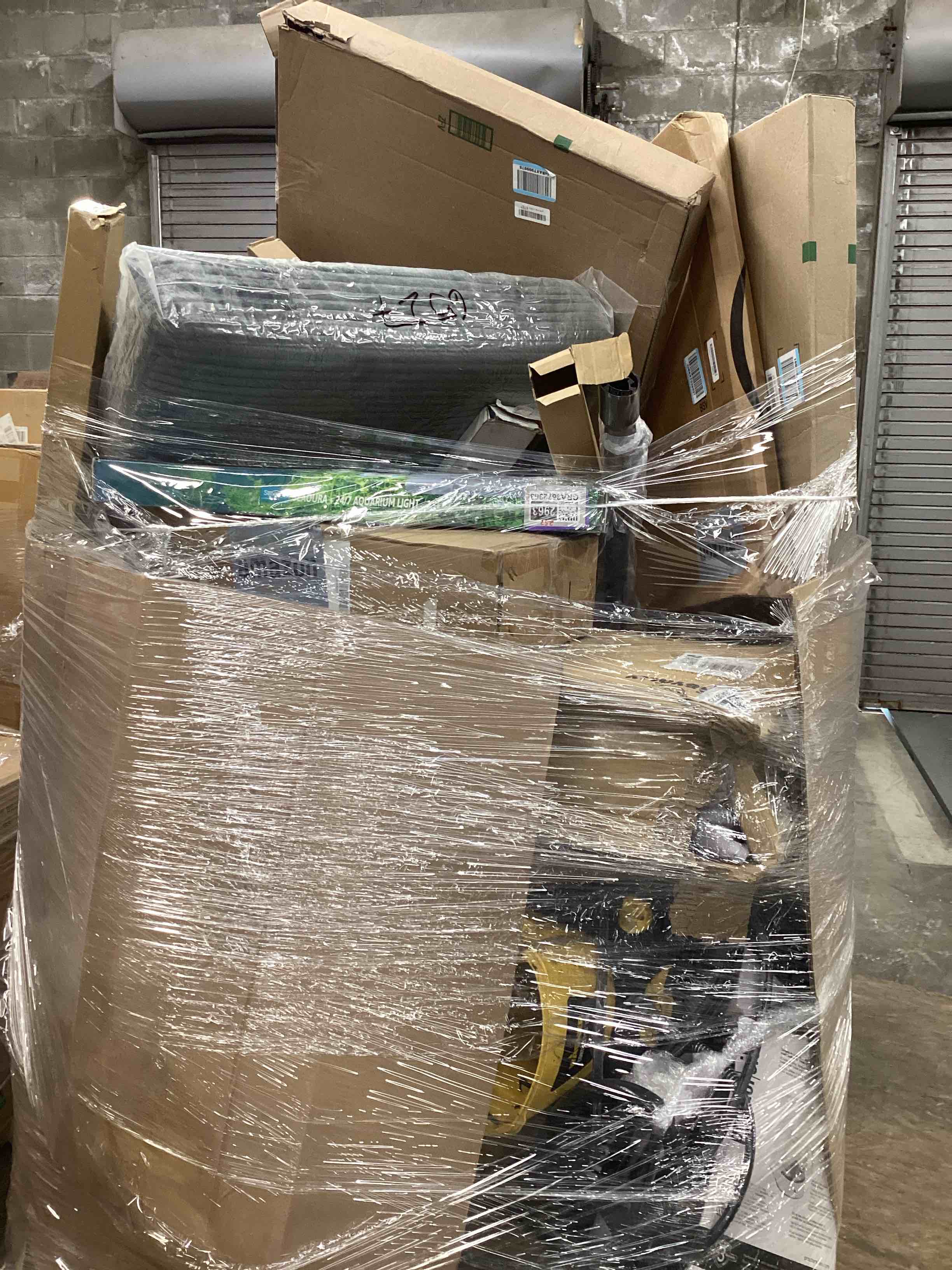 Pallet of different items furniture, patio umbrella, cushion etc.