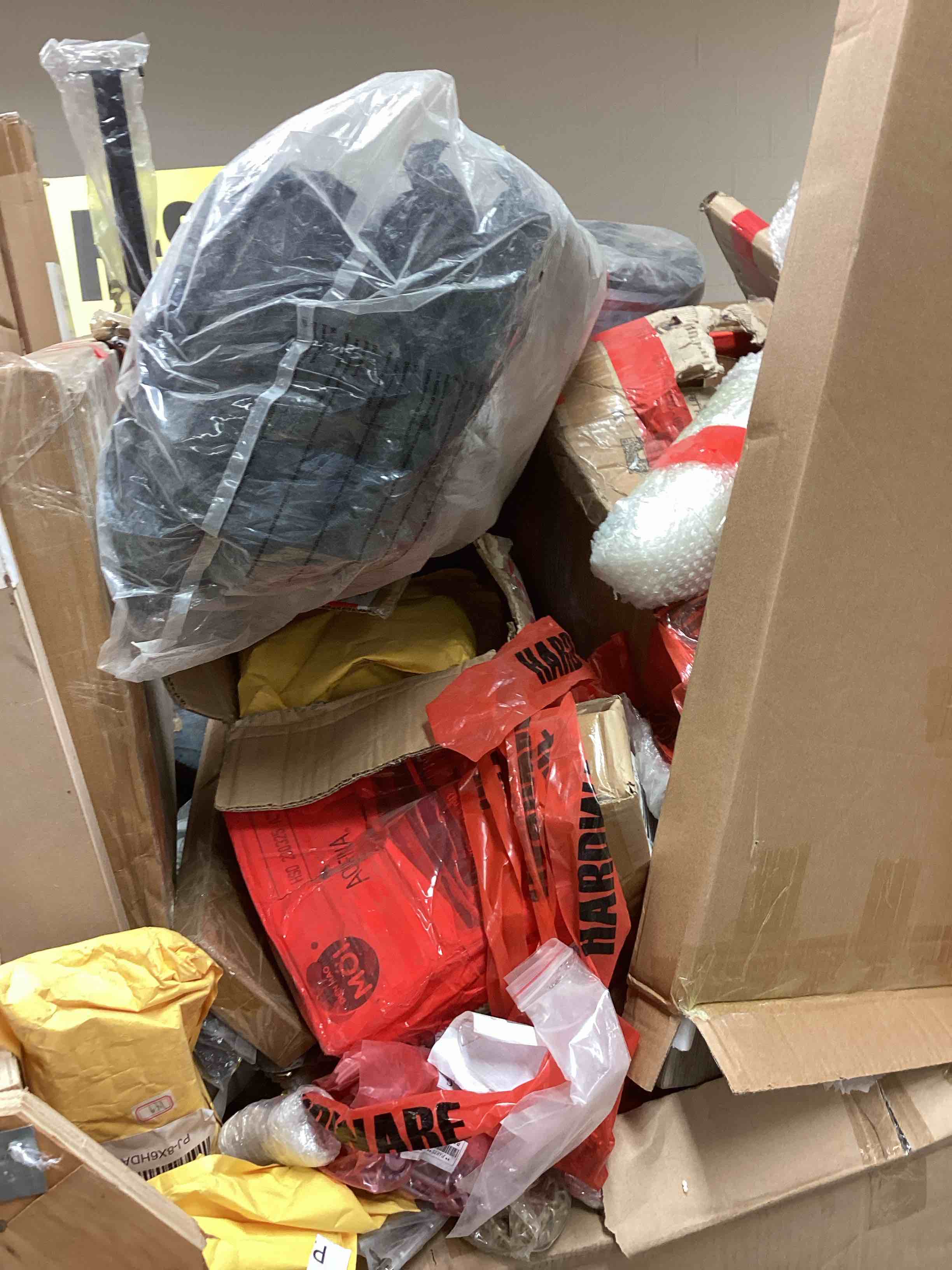 Pallet of 20 miscellaneous hardware furniture including screws, table tops, bed frames, sofa legs, etc...