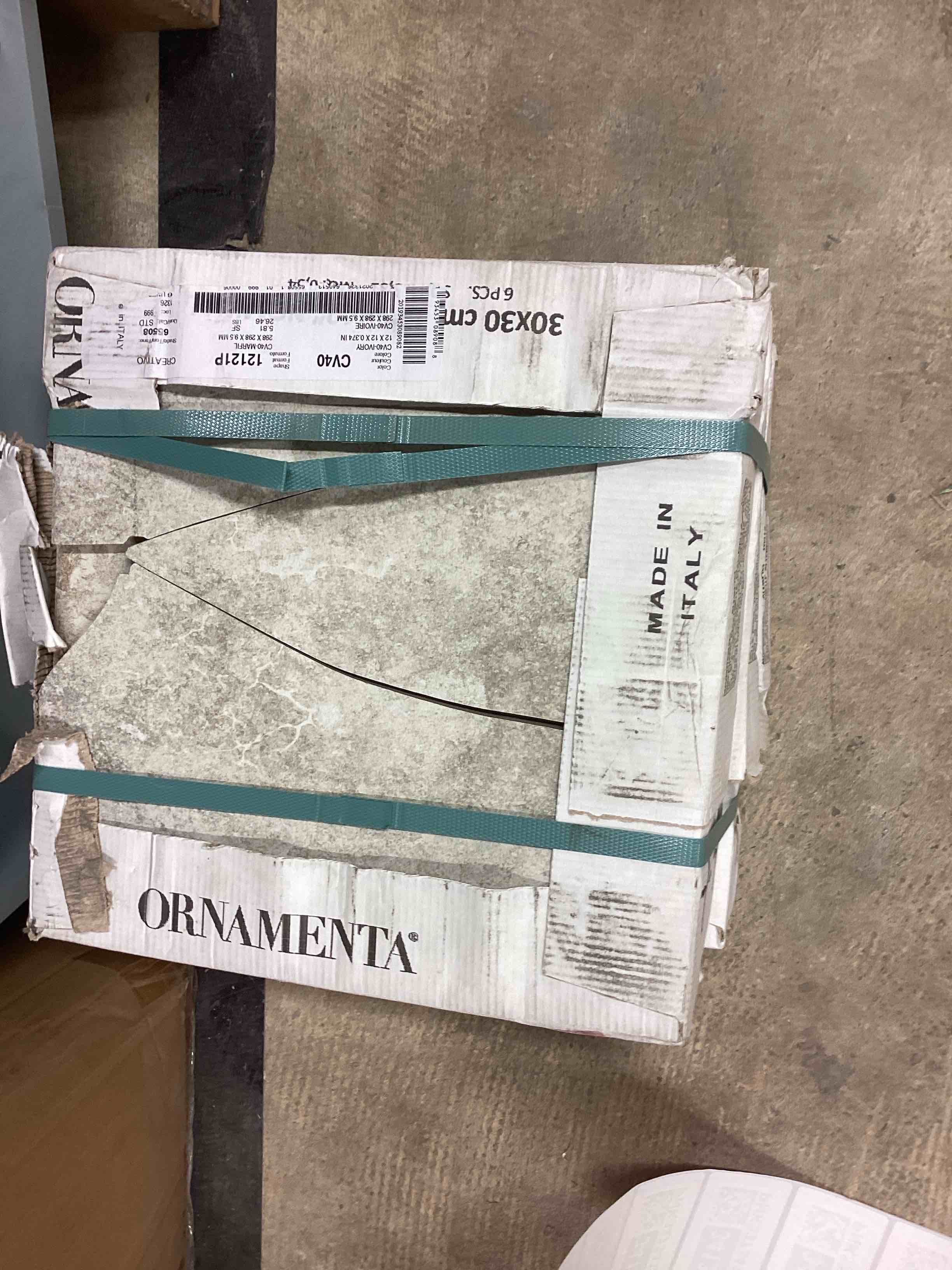 12x12 tile color ivory (3 boxes to pick up)