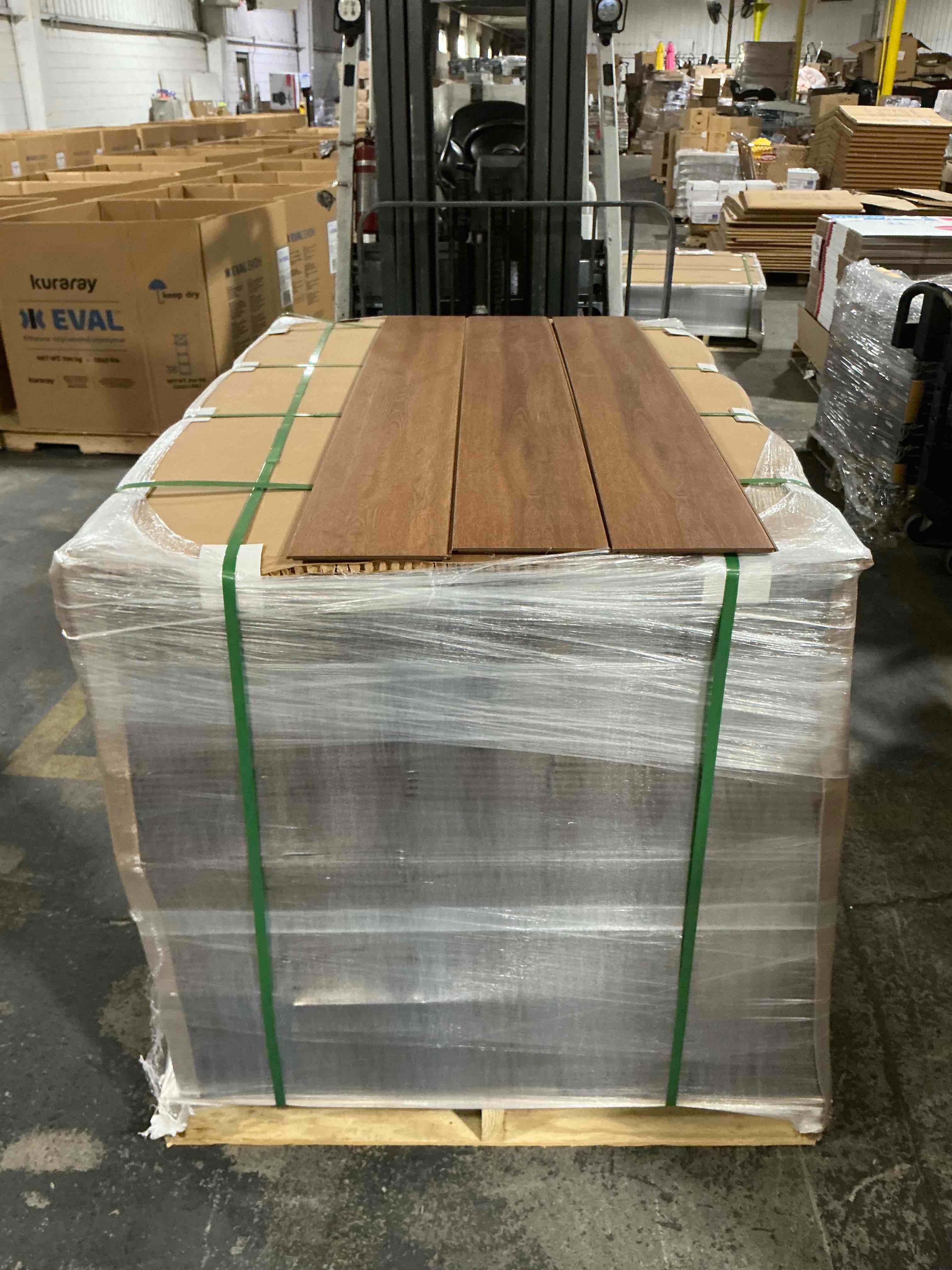 1228.91 12 mm laminate flooring with attached pad 7.5625 inches wide by 60 inches long your bid per sq ft