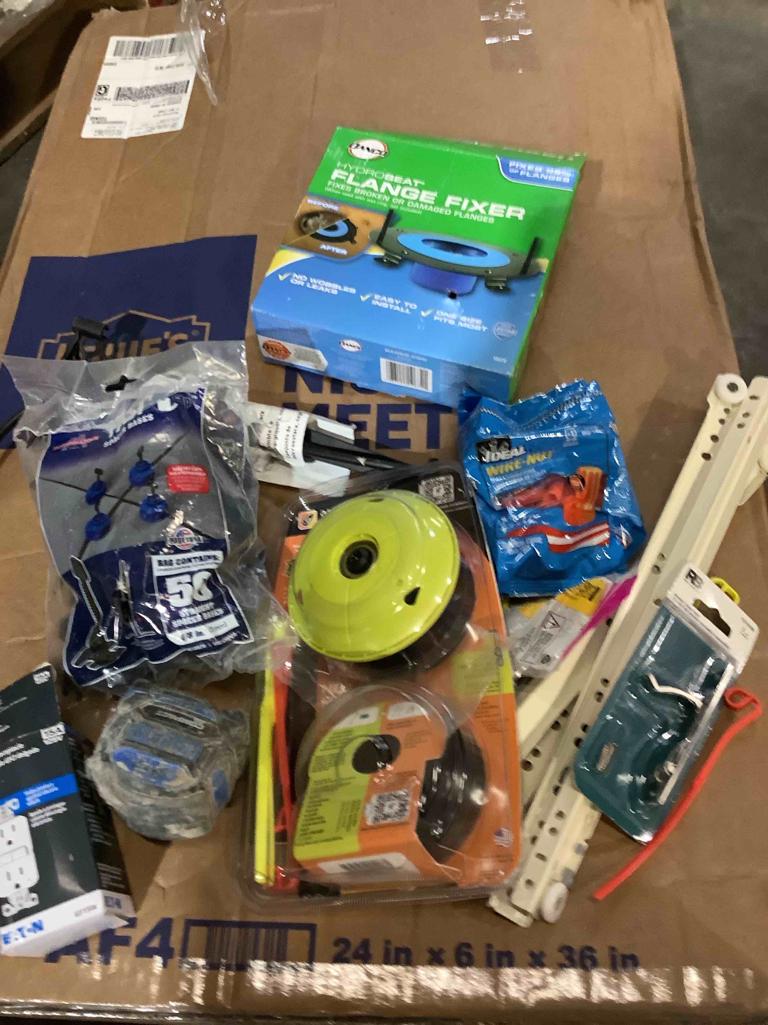 assorted hardware, including flang fixer, measuring tape, wire nuts, face, and much more