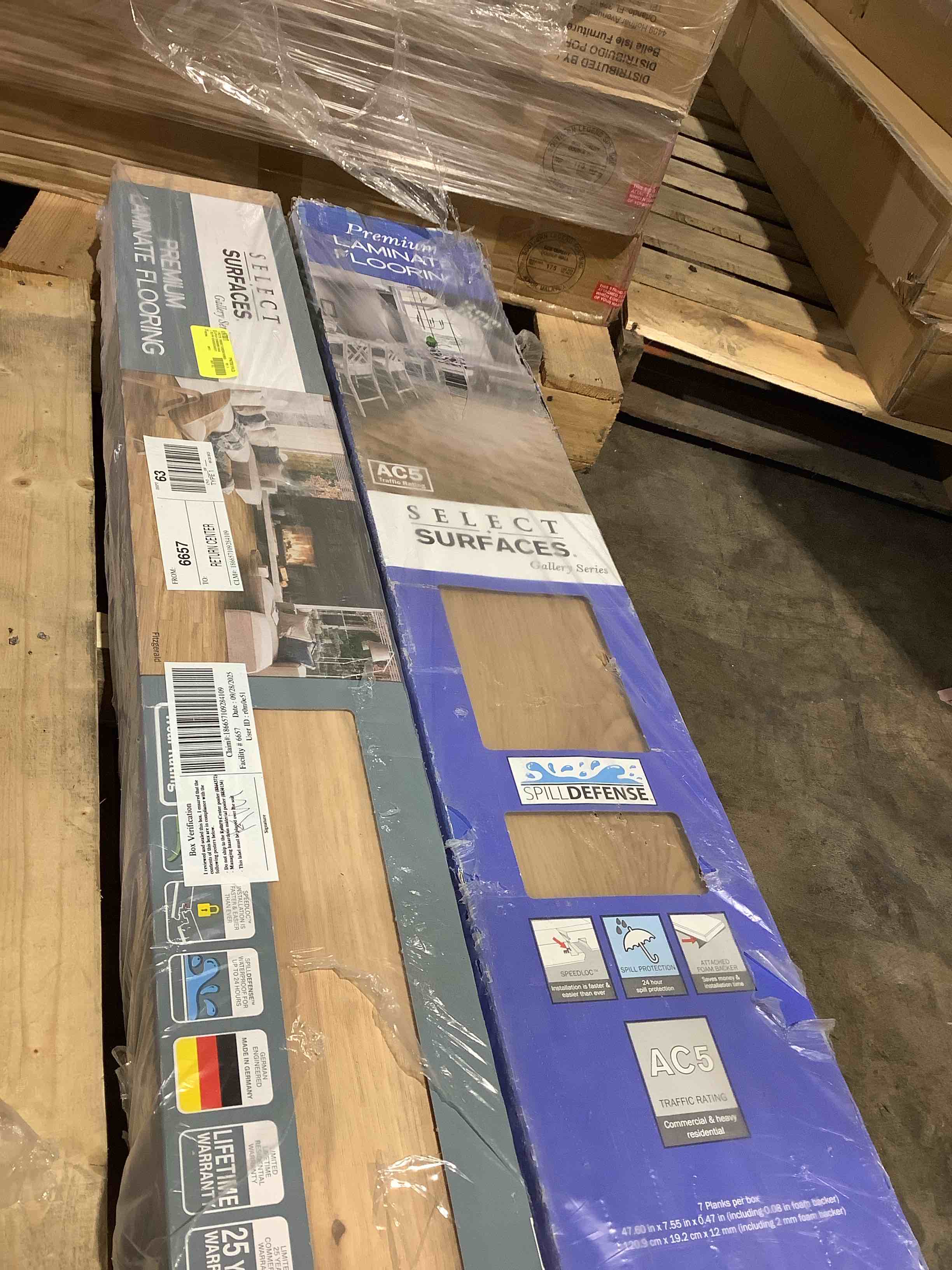 Assorted Select Premium Laminated Flooring. 2 boxes that don’t match but still useful for closet or foyer.