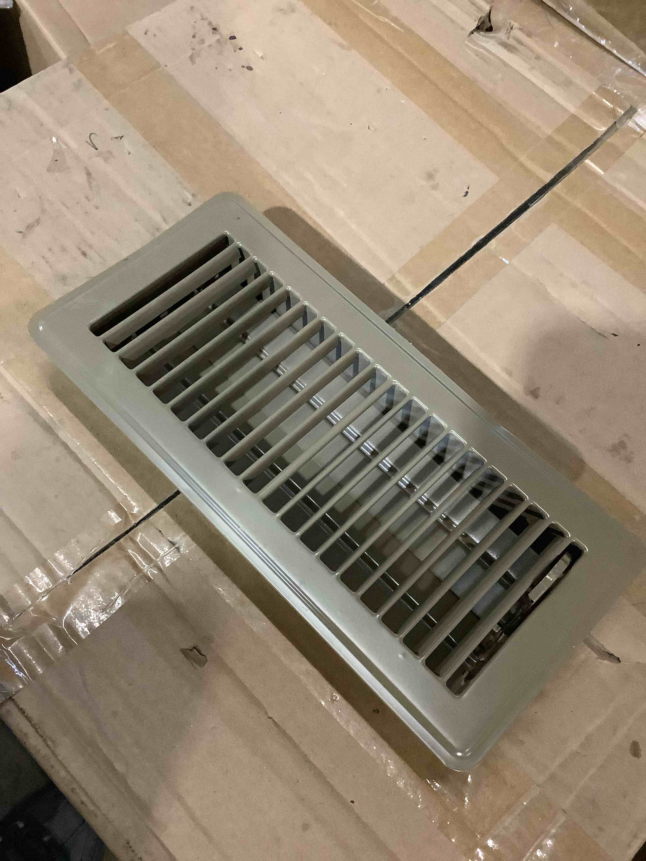 Brown Louvered Floor Register