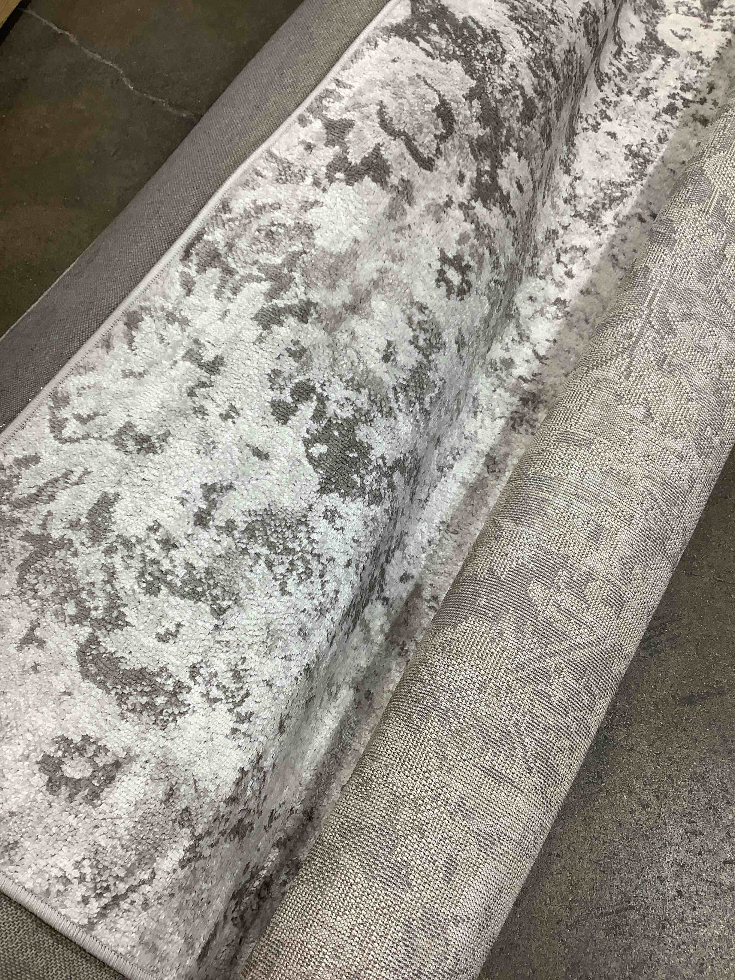 Augustin oriental gray white area rug