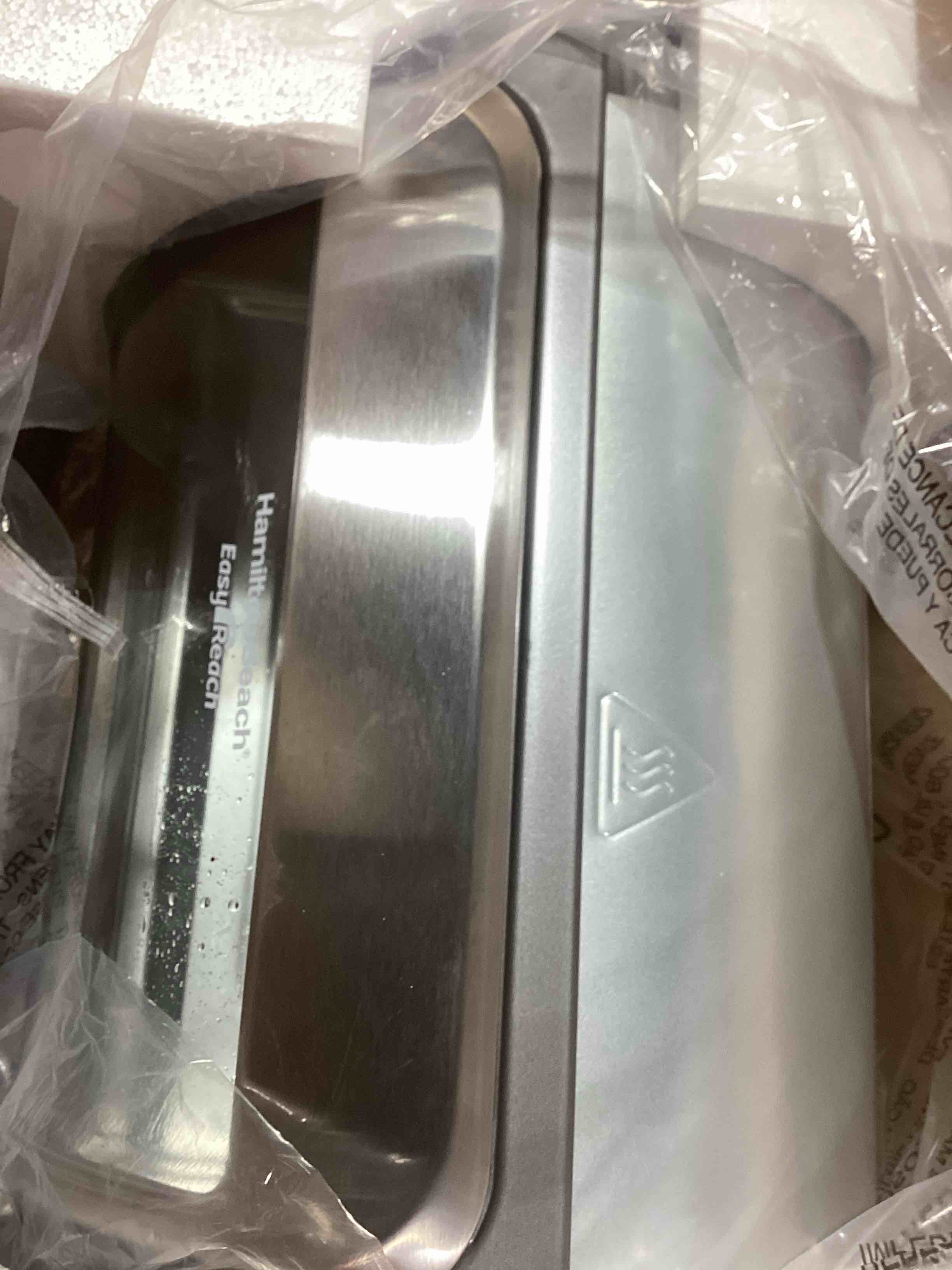 Condition photo showing Good Condition for hamilton beach easy reach 4-slice countertop toaster oven with roll-top door, 1200 watts, fits 9” pizza, 3 cooking functions for bake, broil and toast, silver (31344da) silver 4-slice