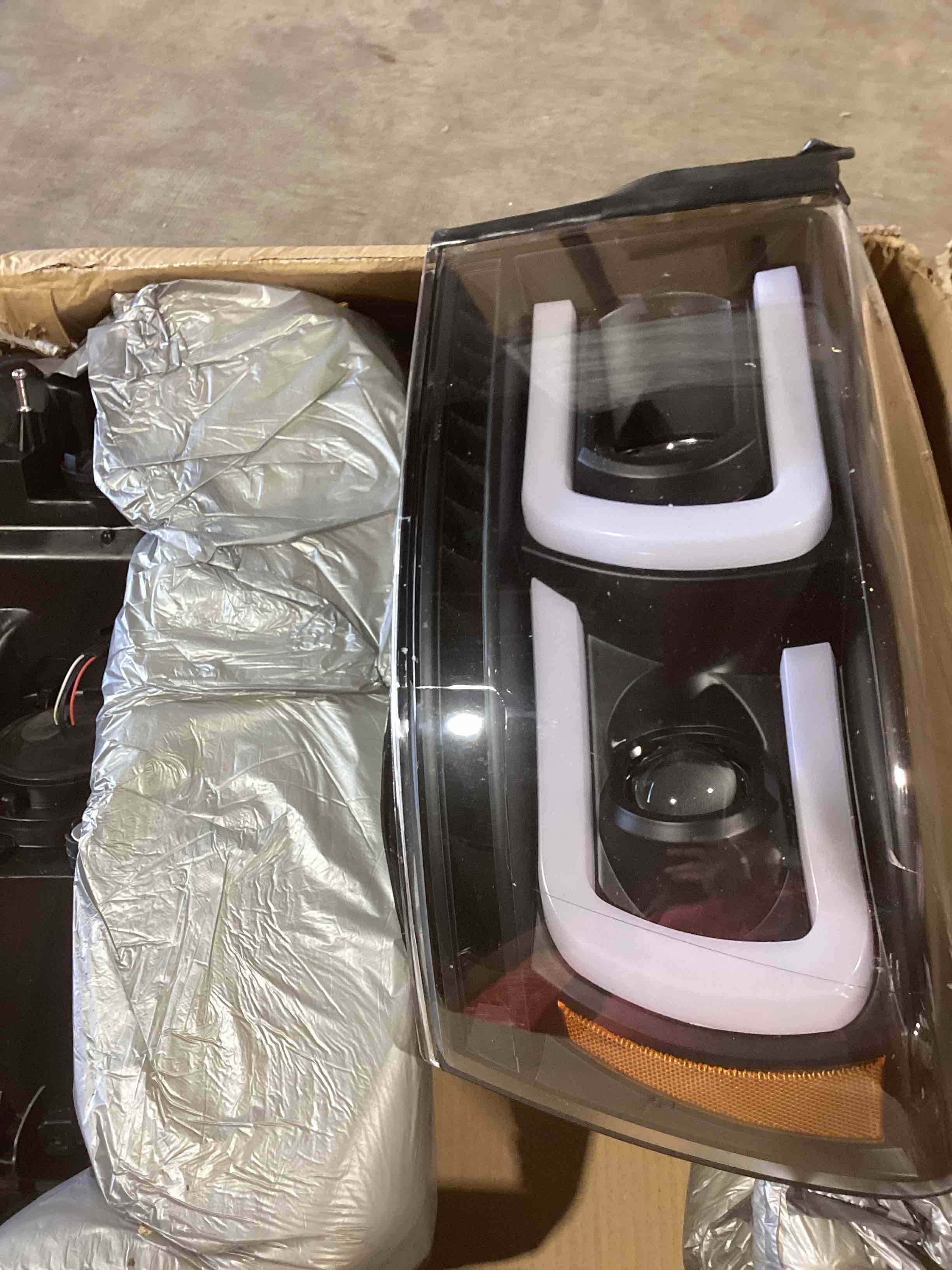 Condition photo showing Good Condition for headlights for 2009-2018 dodge ram 1500 2010-2018 dodge ram 2500 3500 4500 5500 st tradesman w/led drl (only fit factory dual halogen) amber reflector black housing need h4 bulb